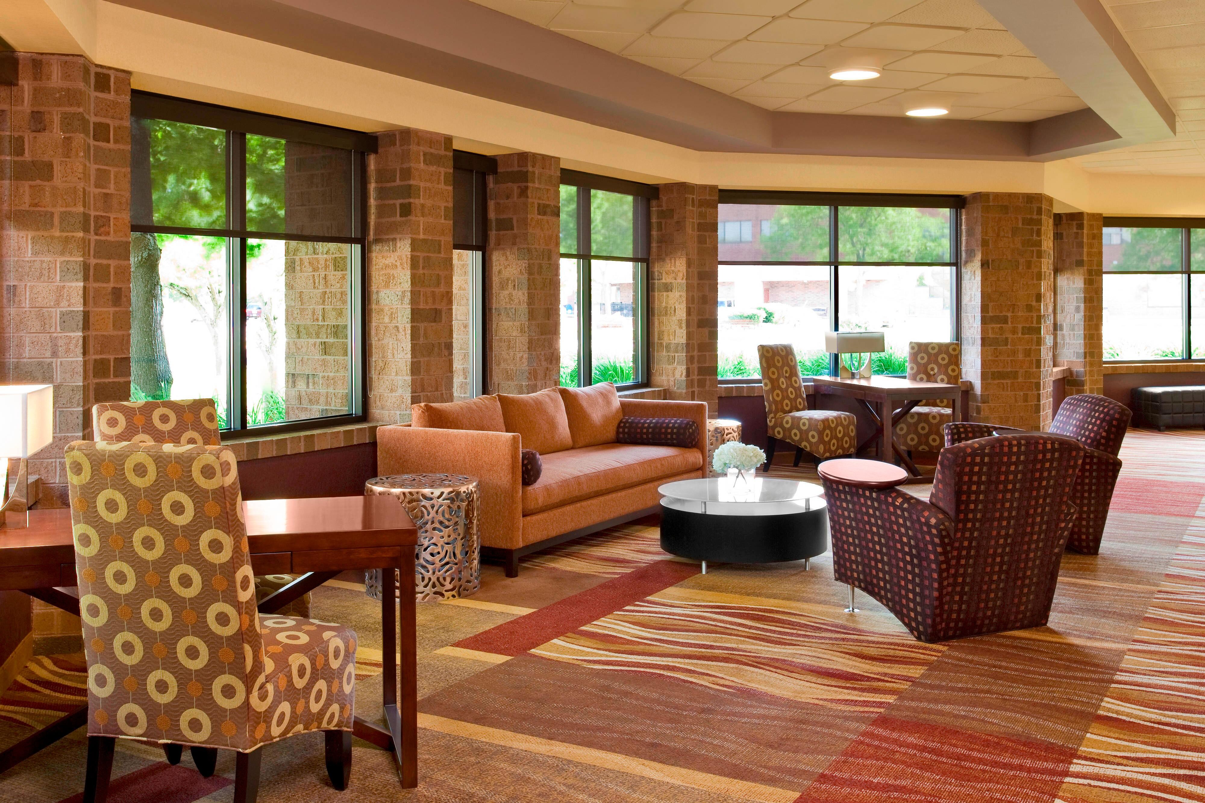 Prefunction space seating area next to large windows