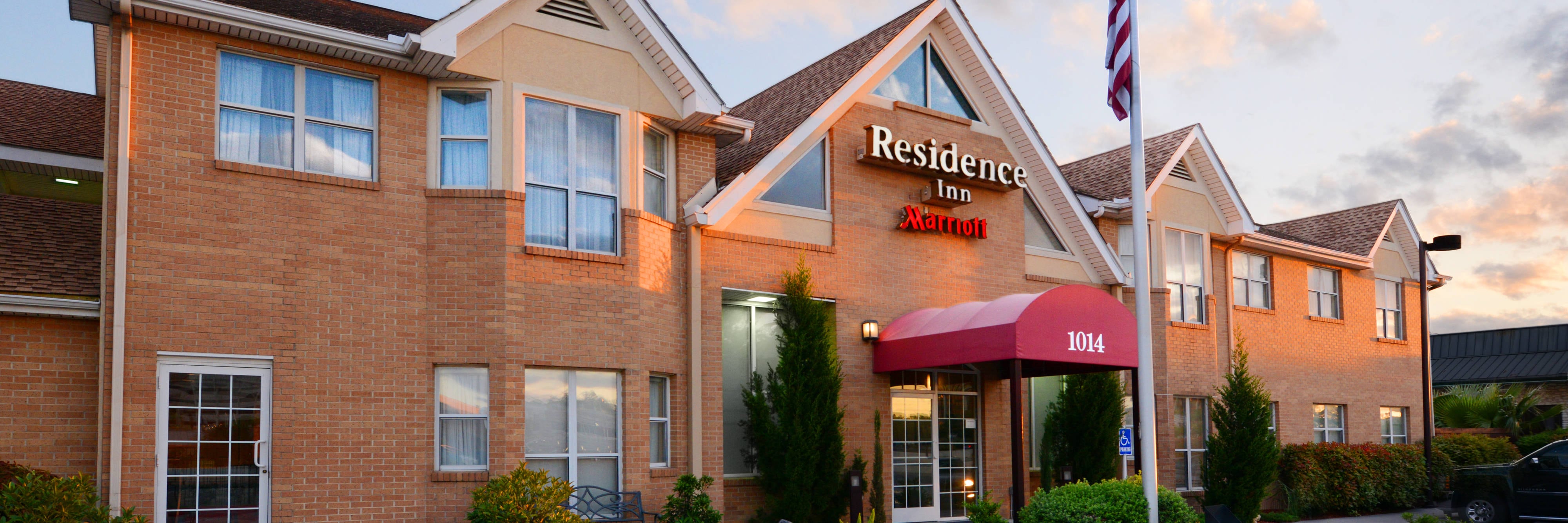 Hotel brick exterior in the evening.