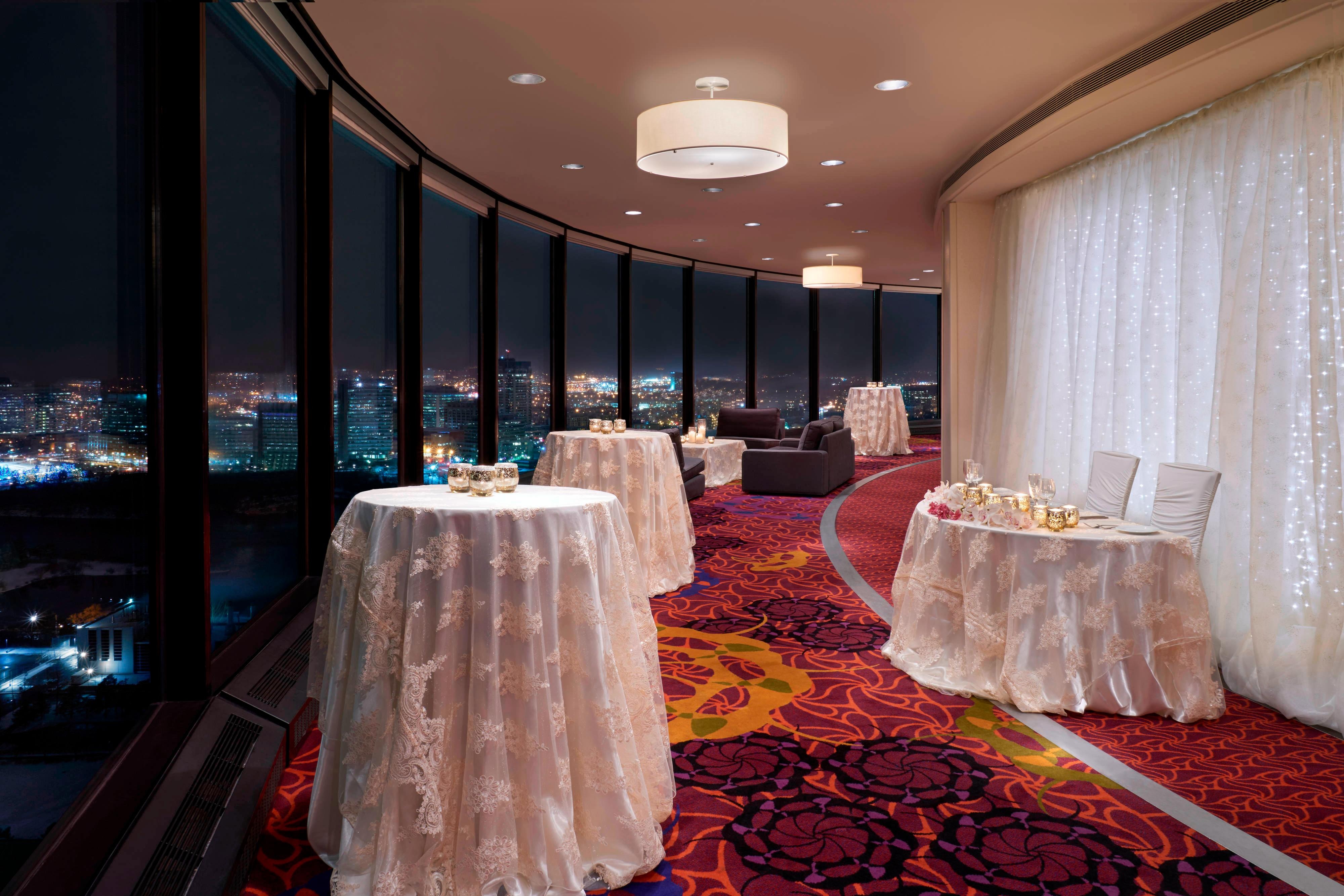 Night view through curved floor-to-ceiling windows