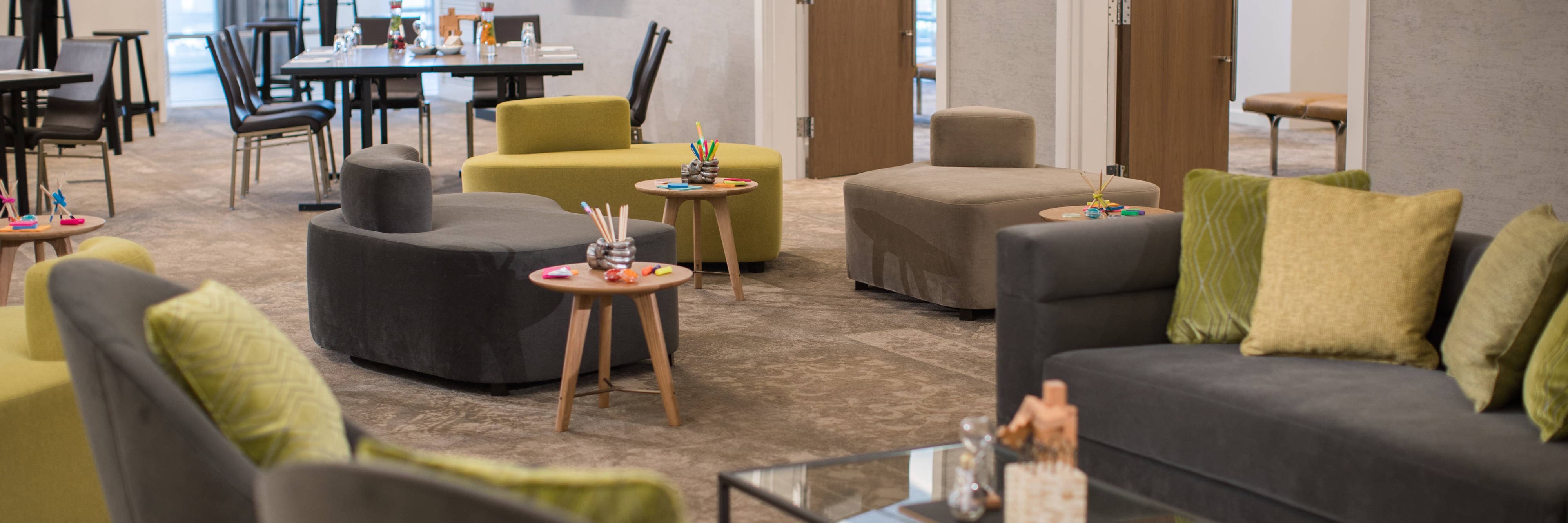 Meeting space with lounge seating and tables