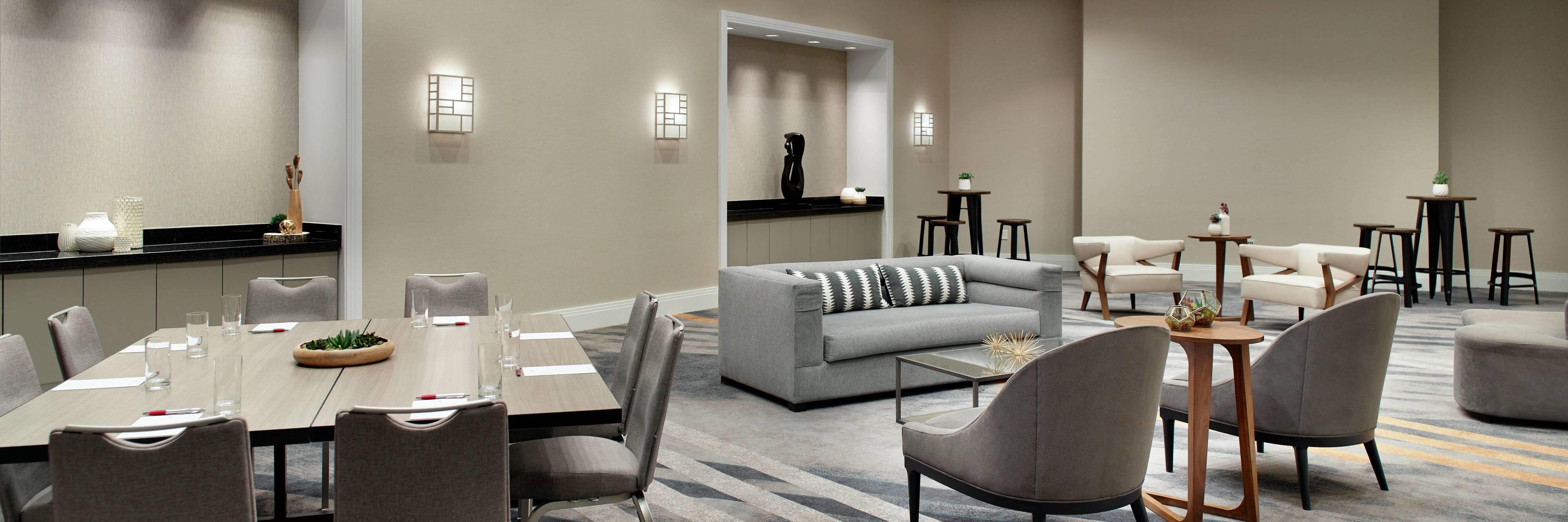 Meeting room with tables and couches
