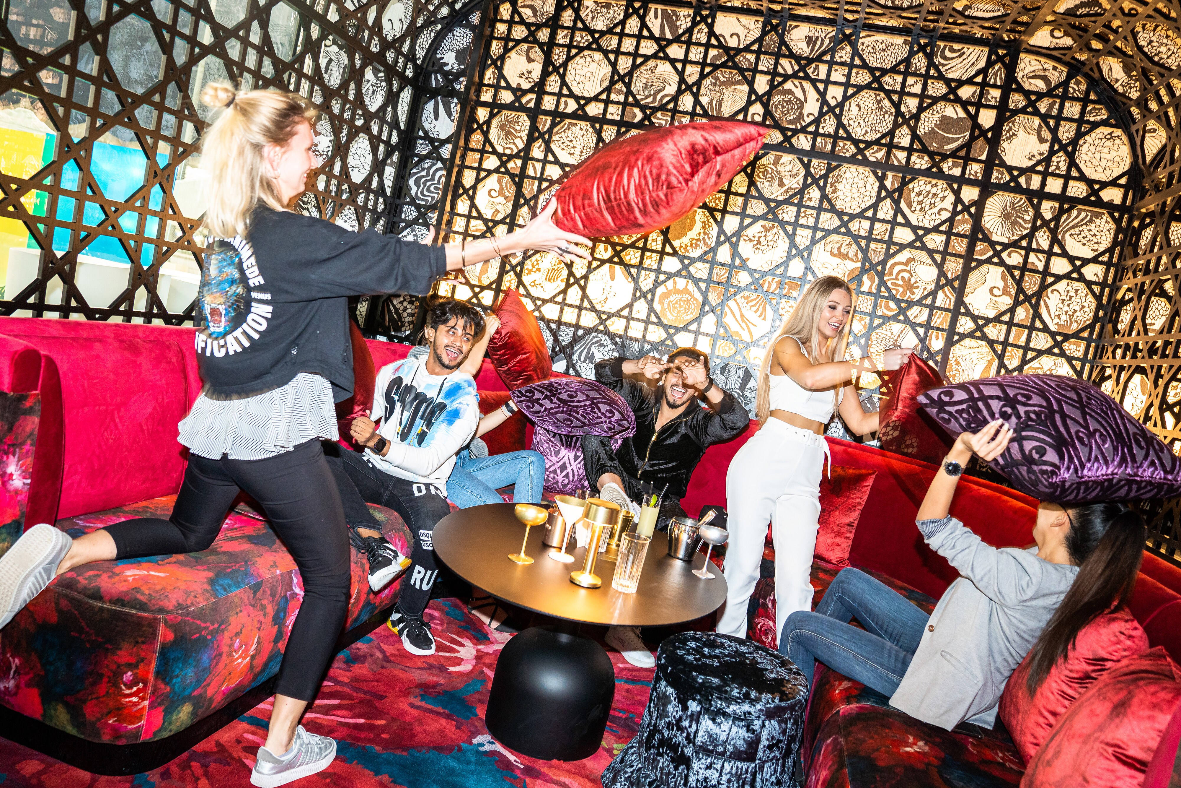 People having a pillow fight
