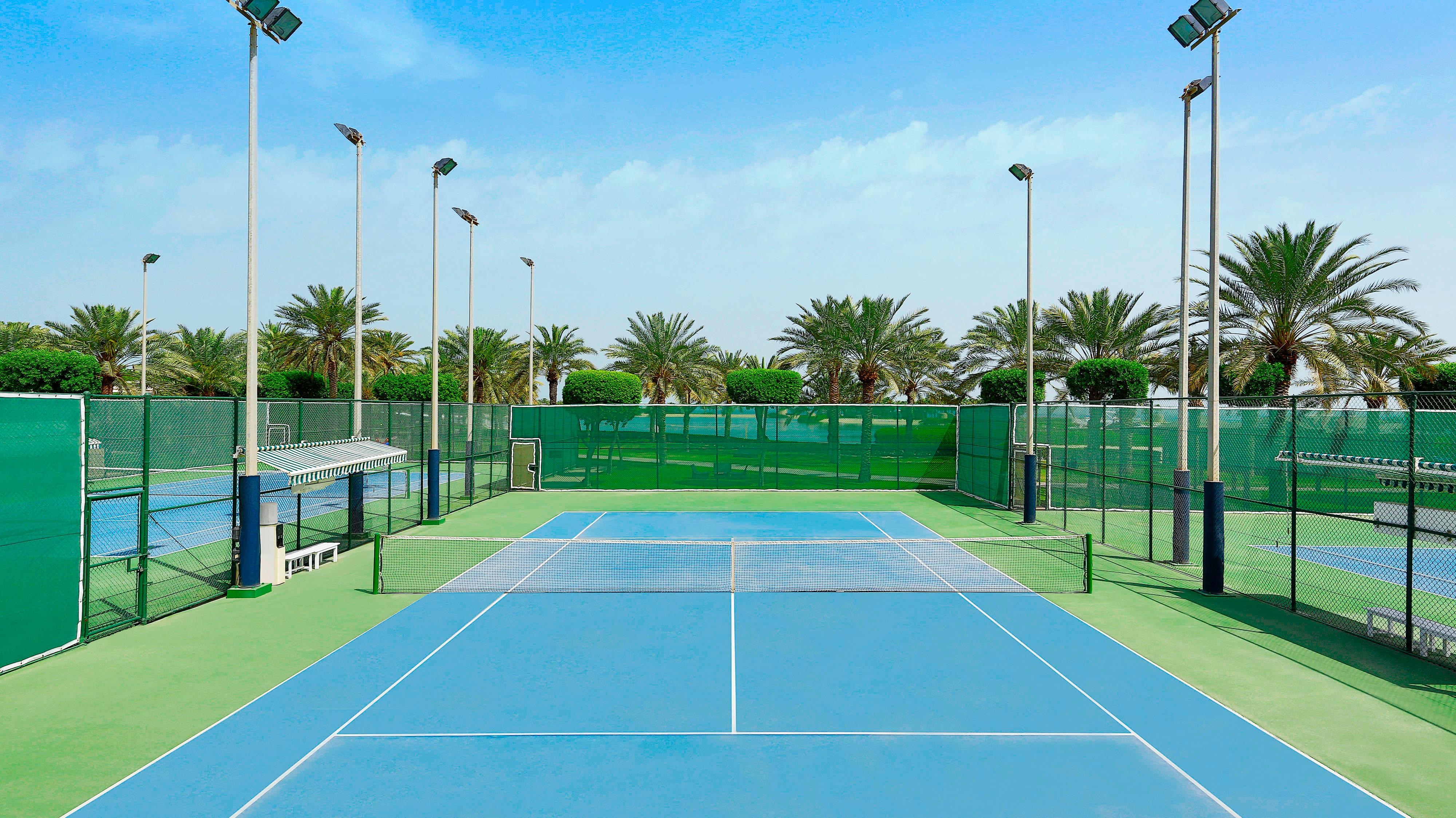 In between splashing around the pool, kids of all ages can also play tennis and enjoy immersive kid-centric activities around the resort. Image credit: The Ritz-Carlton Bahrain