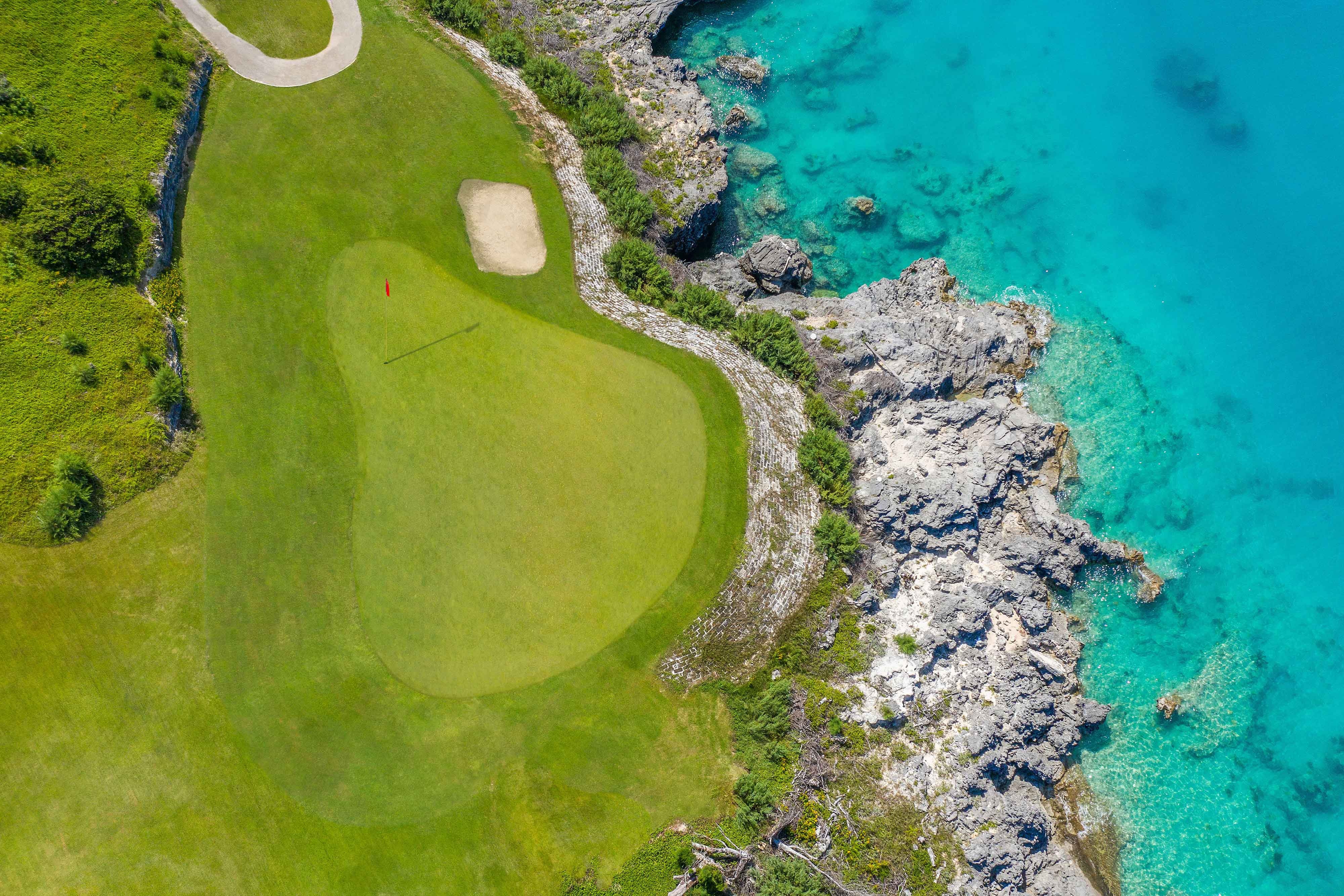 Golf course near the sea from above