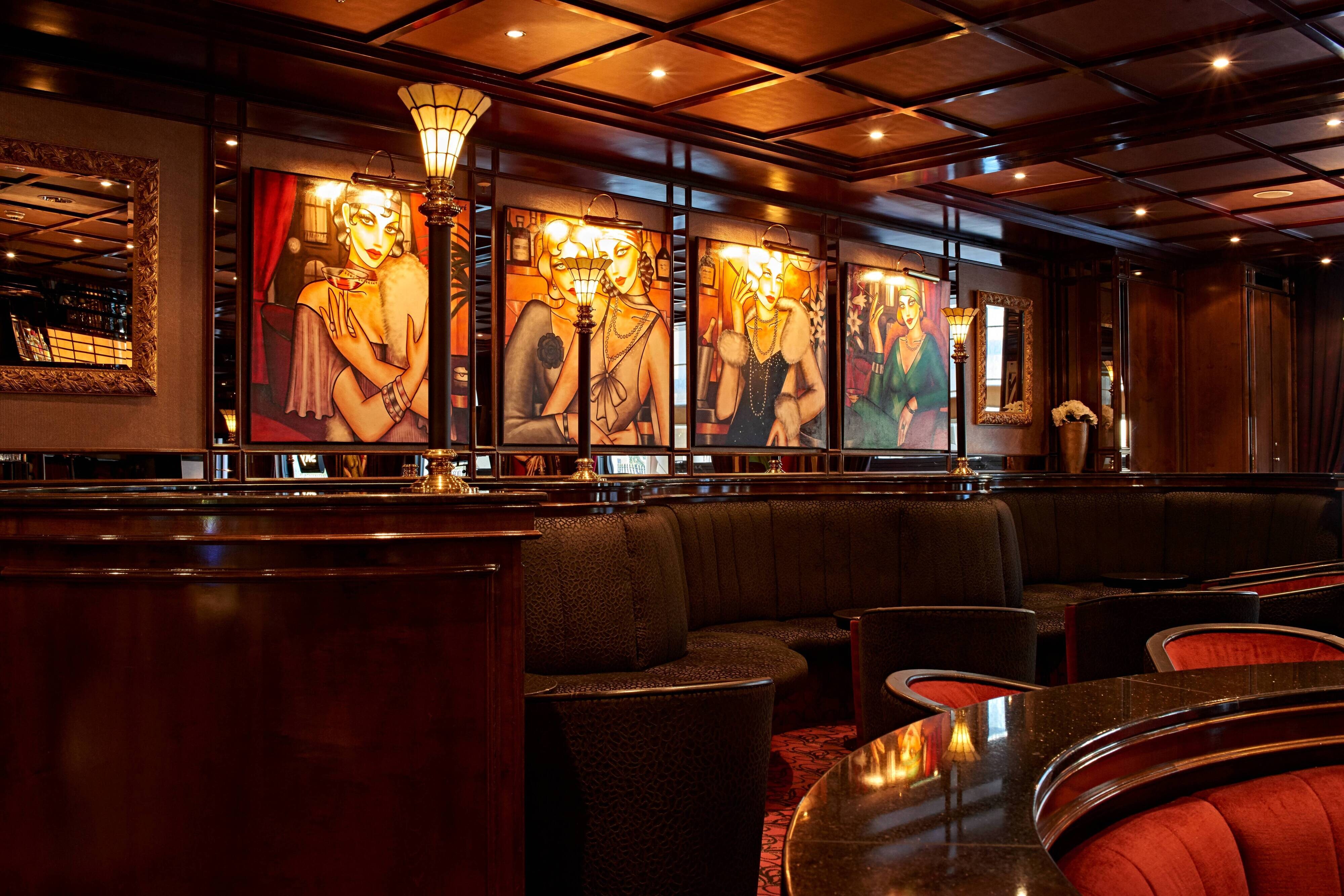 Bar seating with paintings on wall