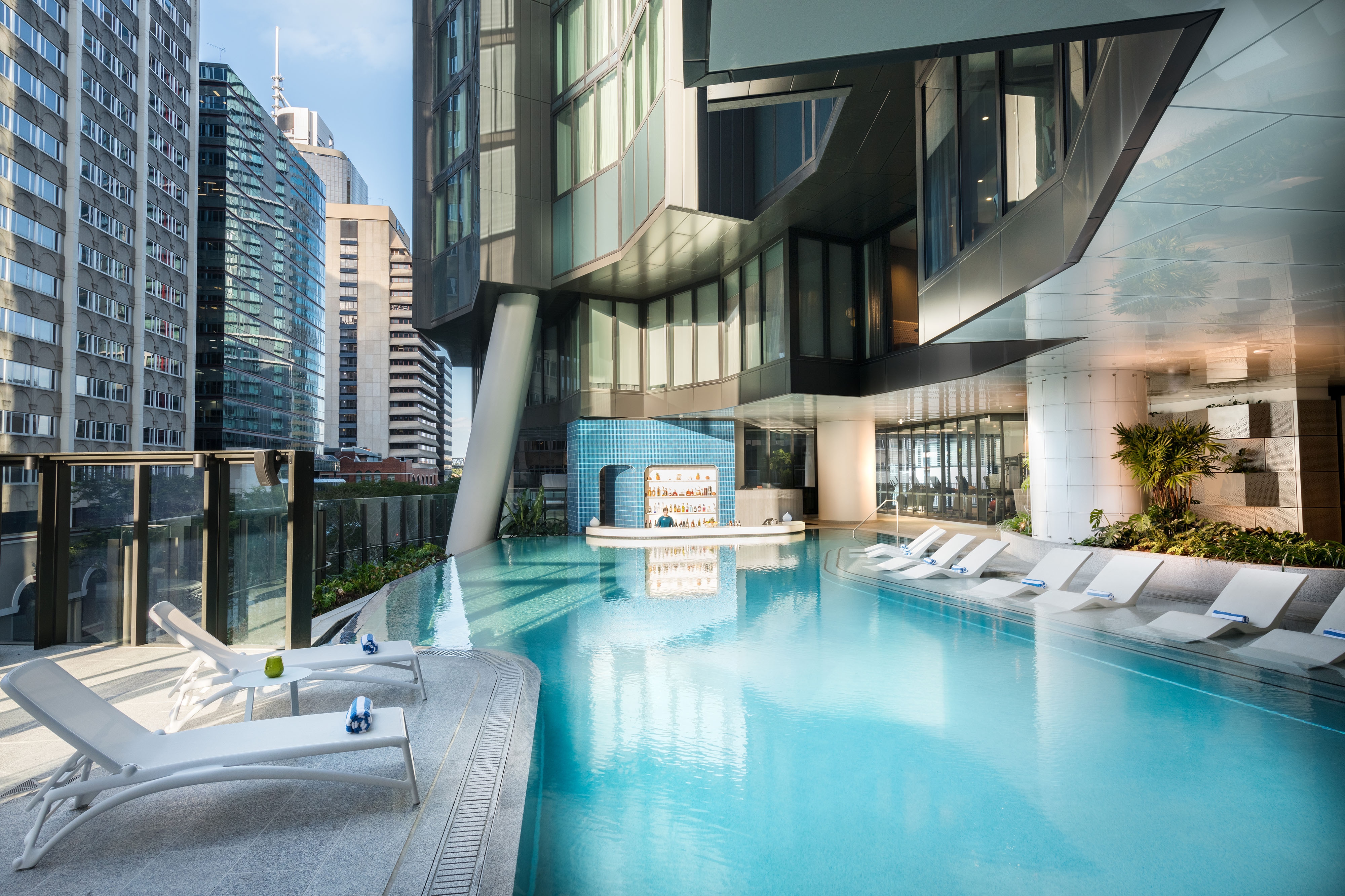 Outdoor swimming pool and pool bar