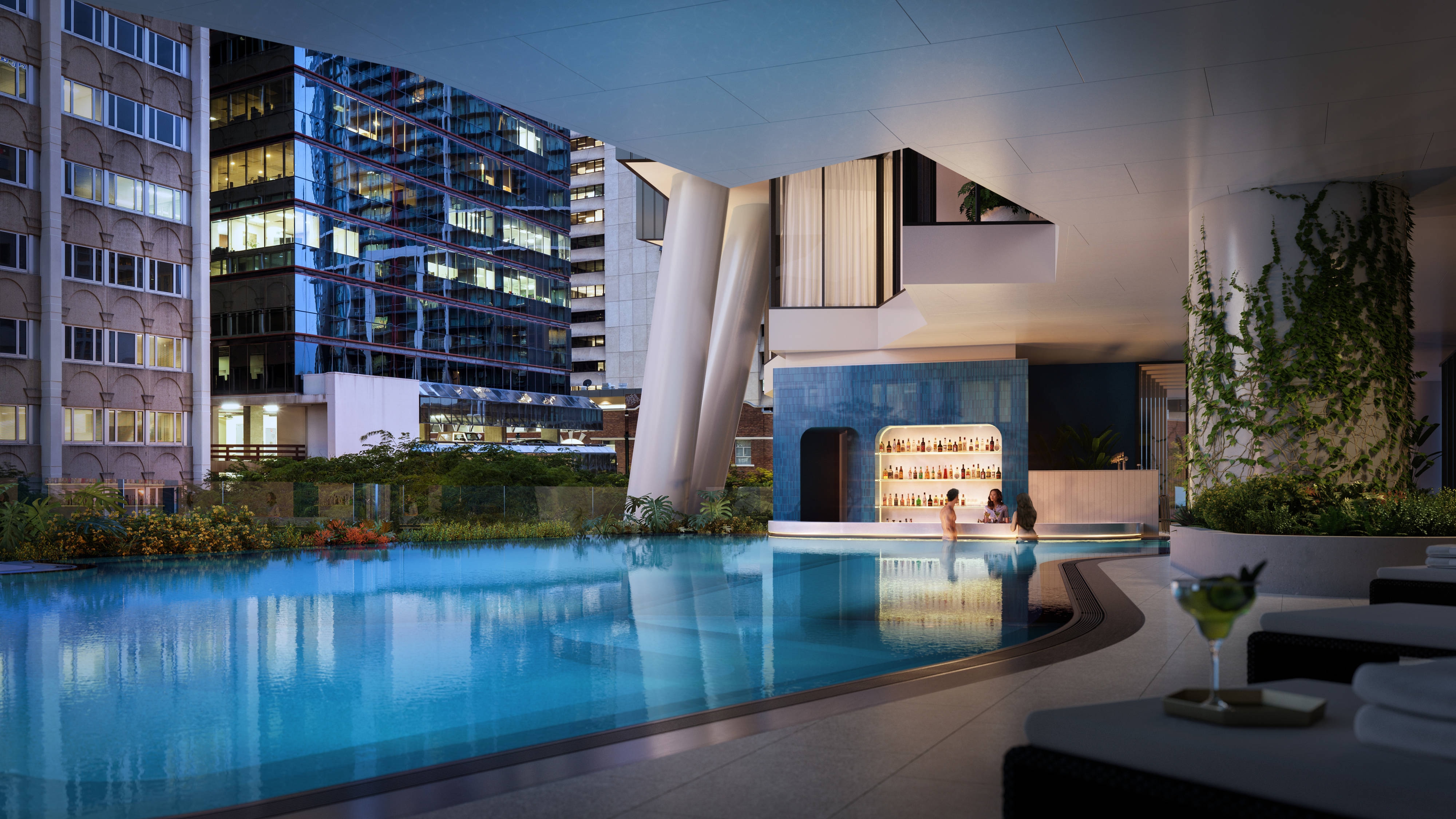 Outdoor swimming pool and pool bar at night