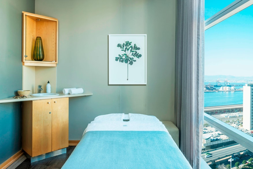 Spa bed next to window.