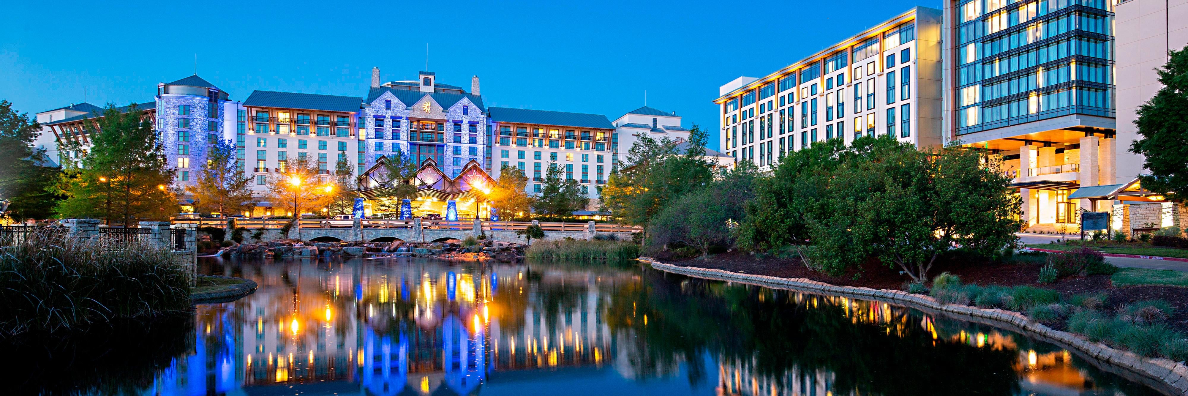 The resort exterior lit up at dusk