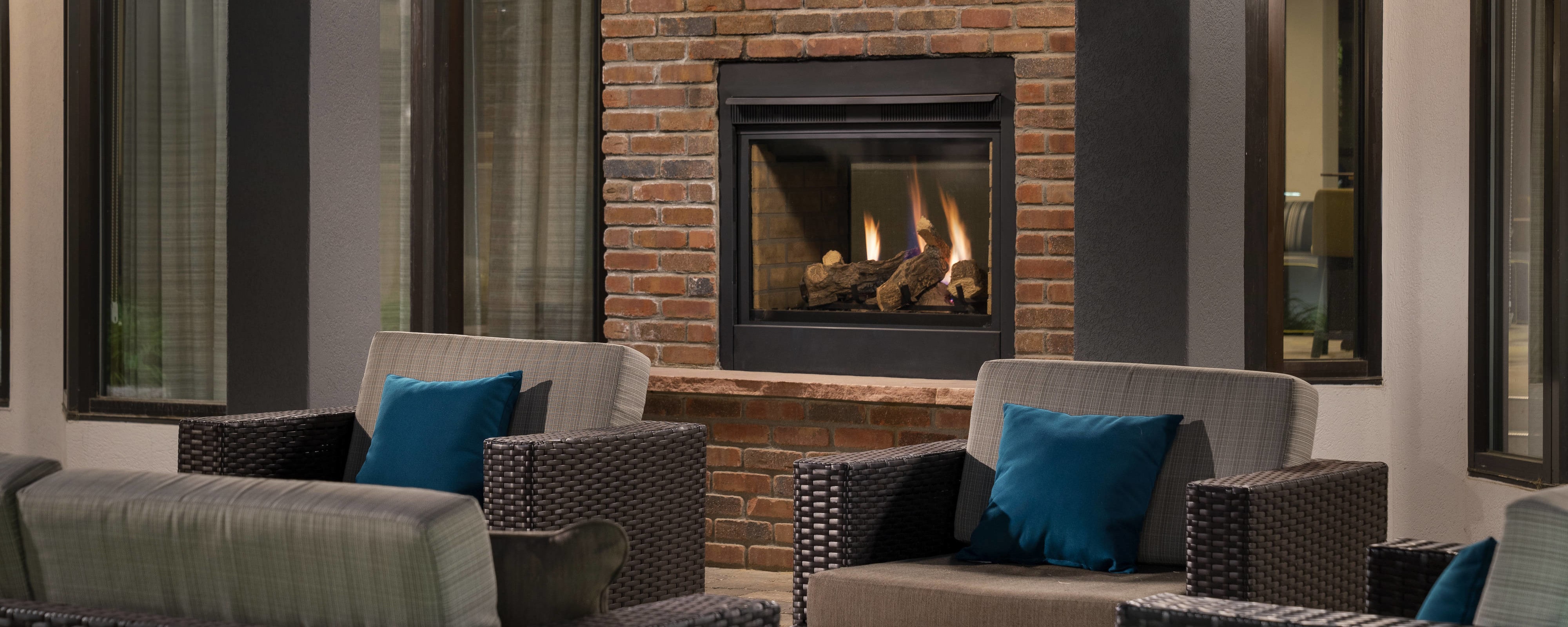 Outdoor patio seating with fireplace