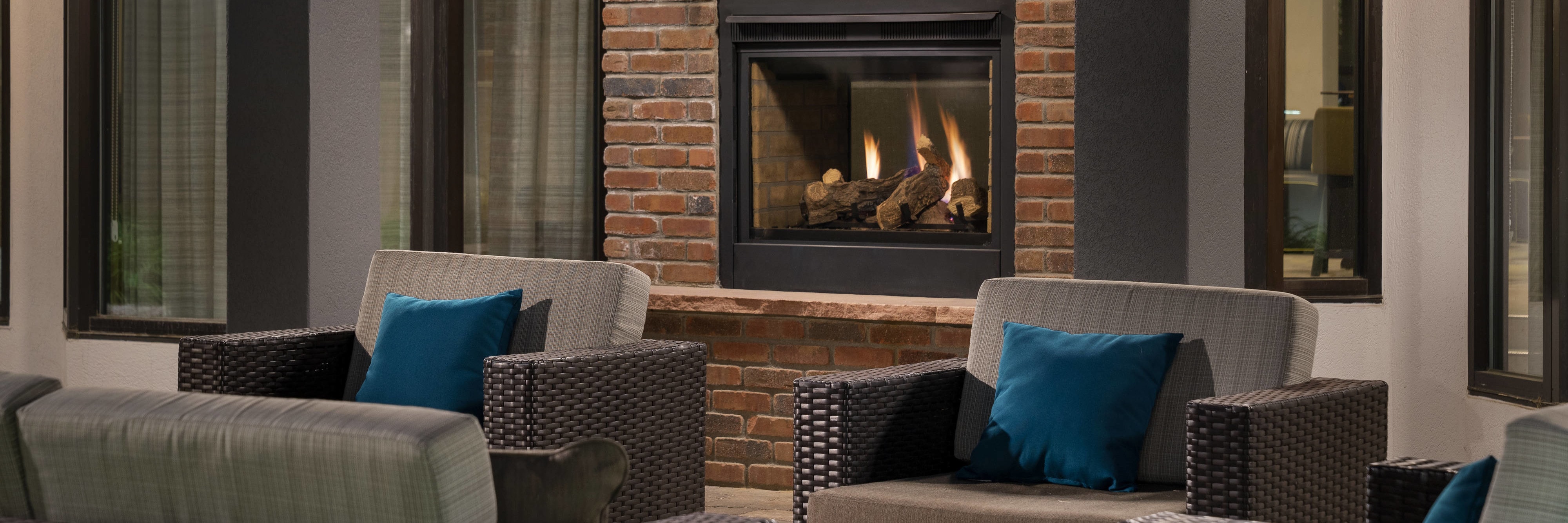 Outdoor patio seating with fireplace