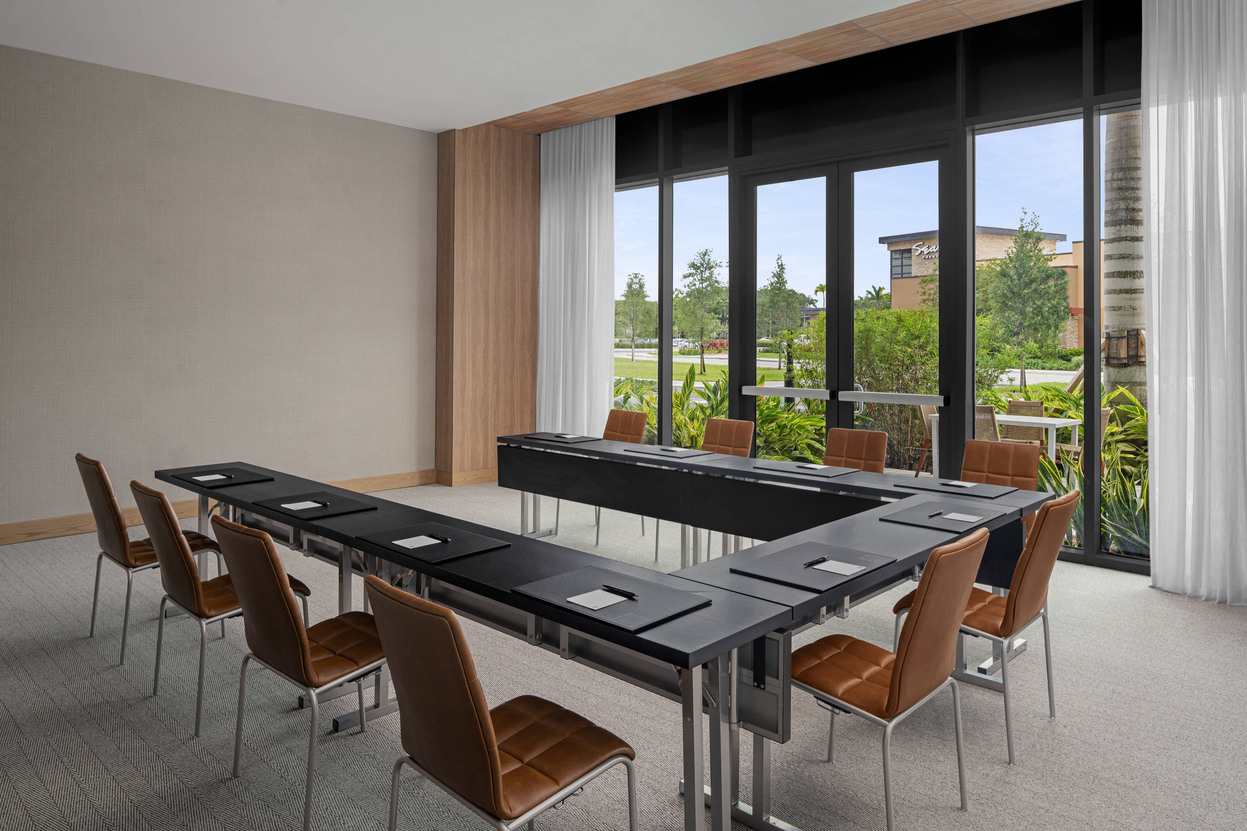 Meeting room U-shape setup with large windows
