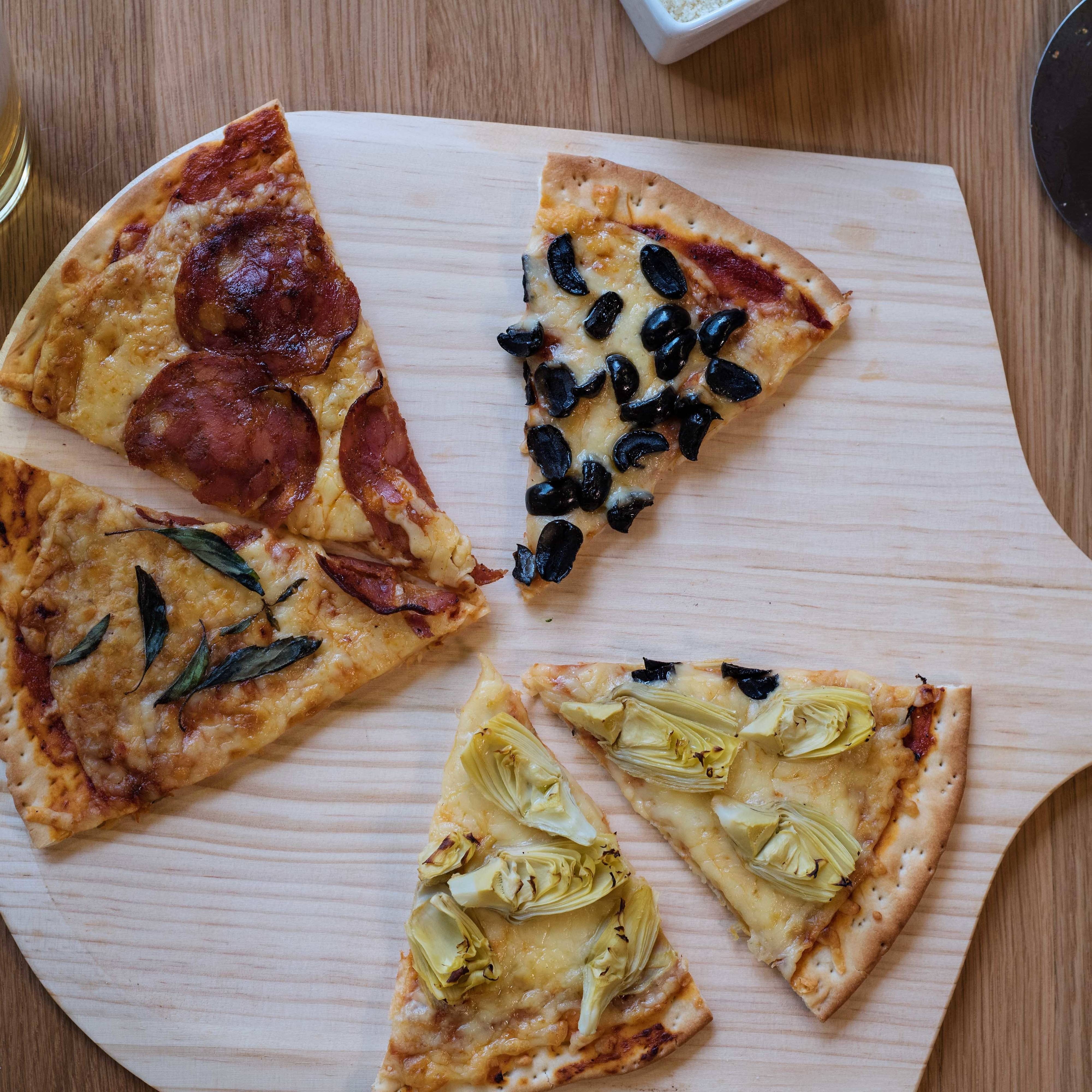 Pizza served at restaurant’s table