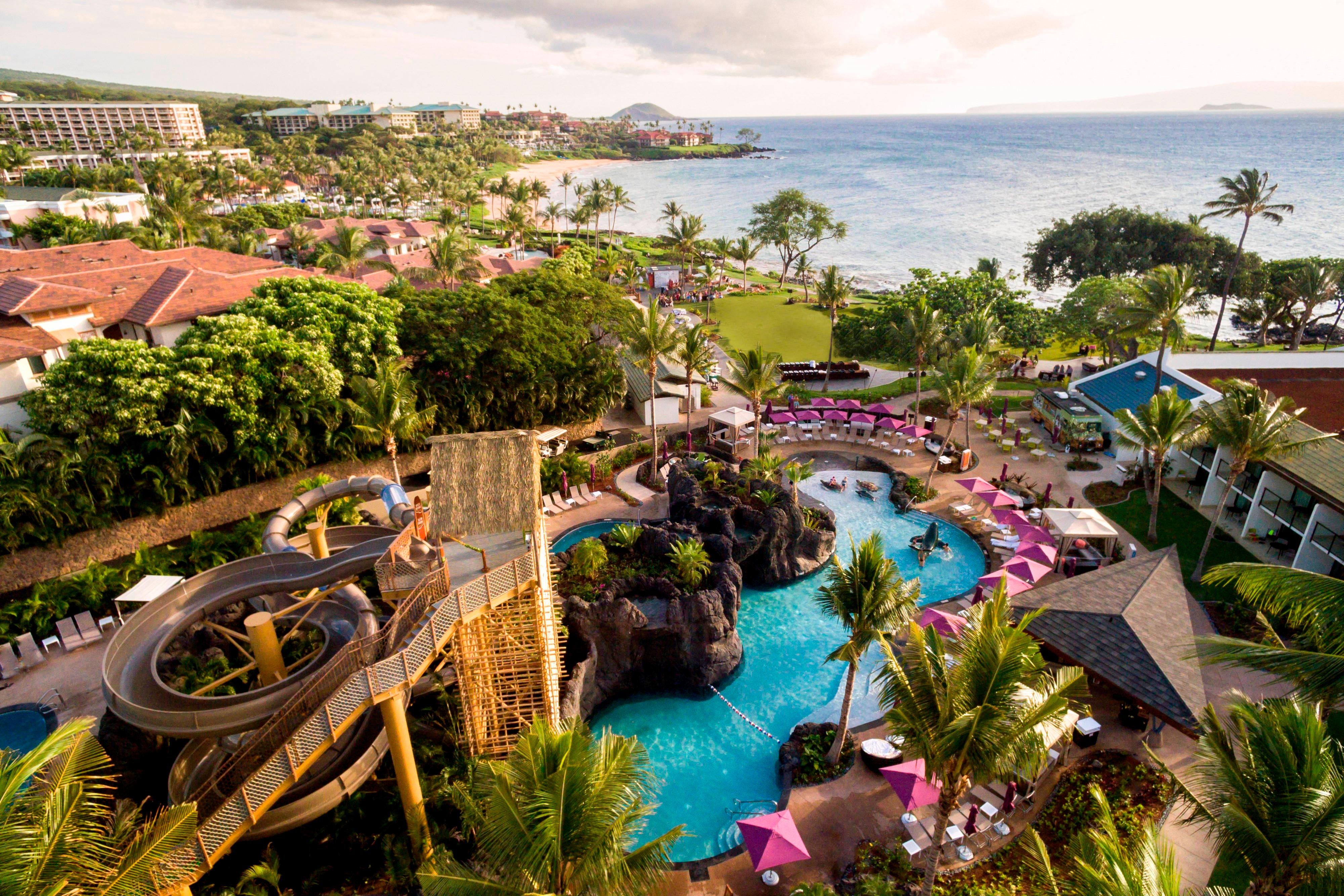 a pool and waterslides, ocean