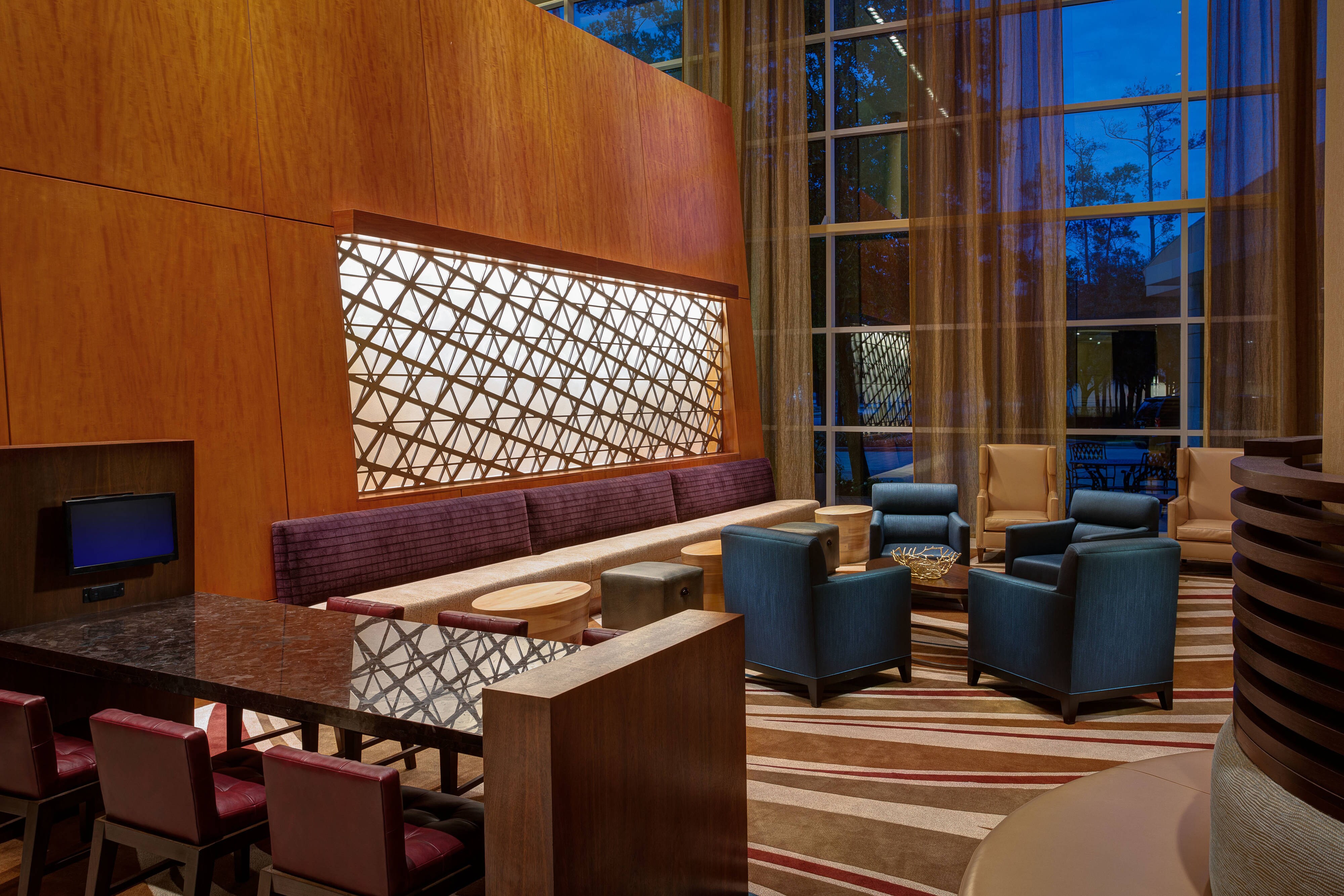 Lobby seating with floor to ceiling windows