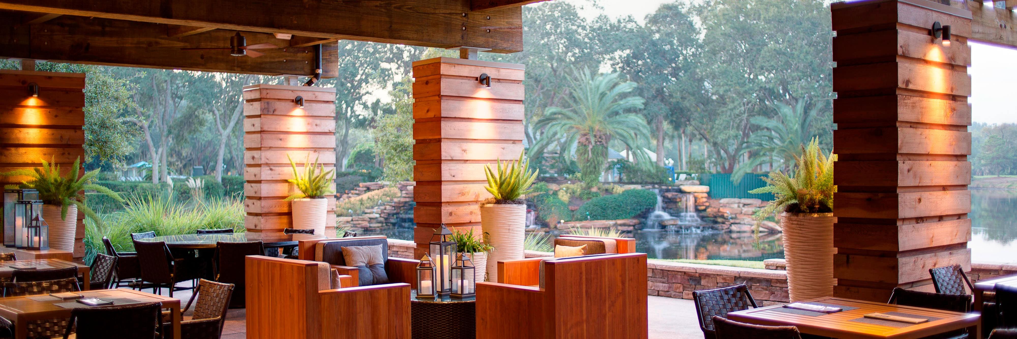 Patio dining next to water feature