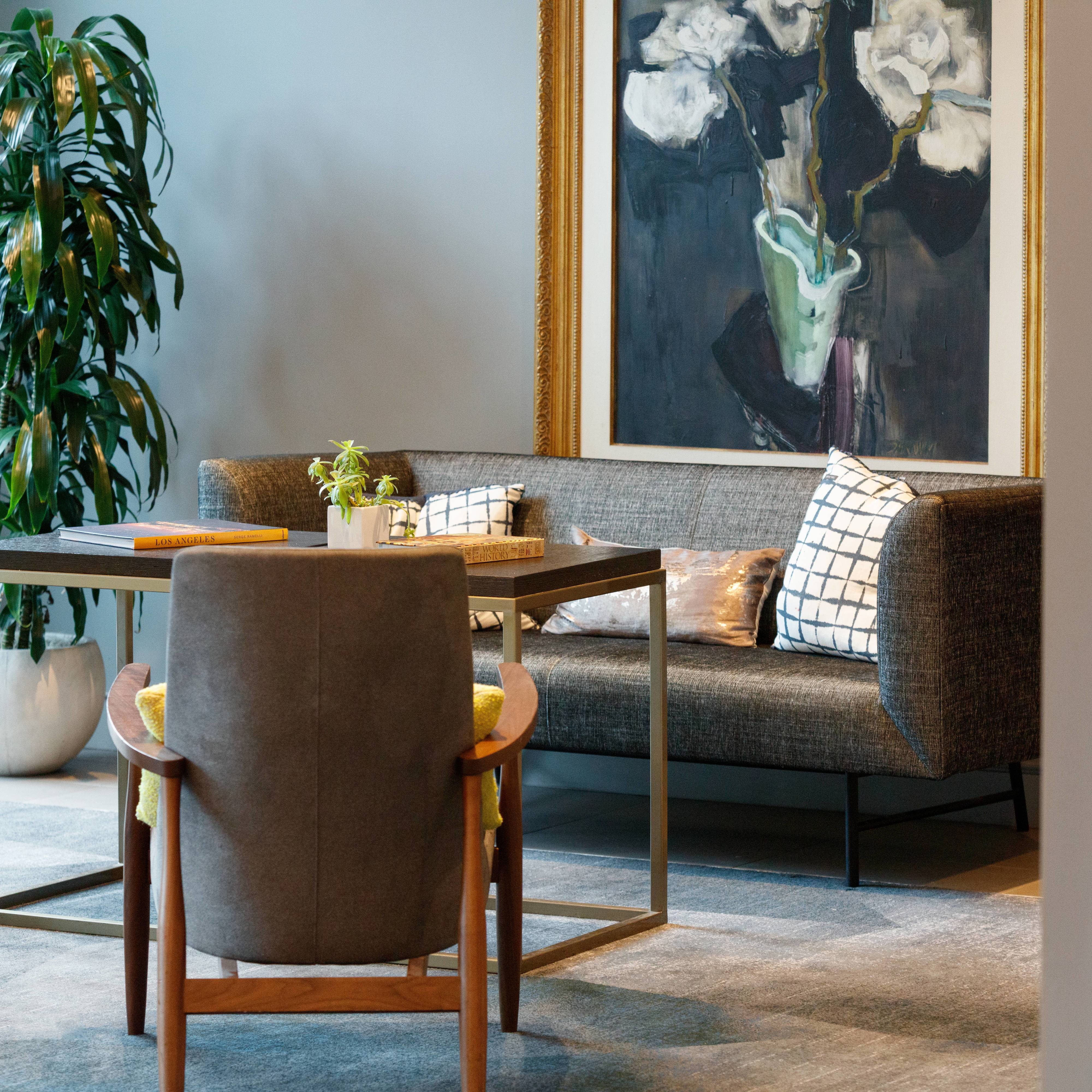 Lobby seating with sofa, chair, and table