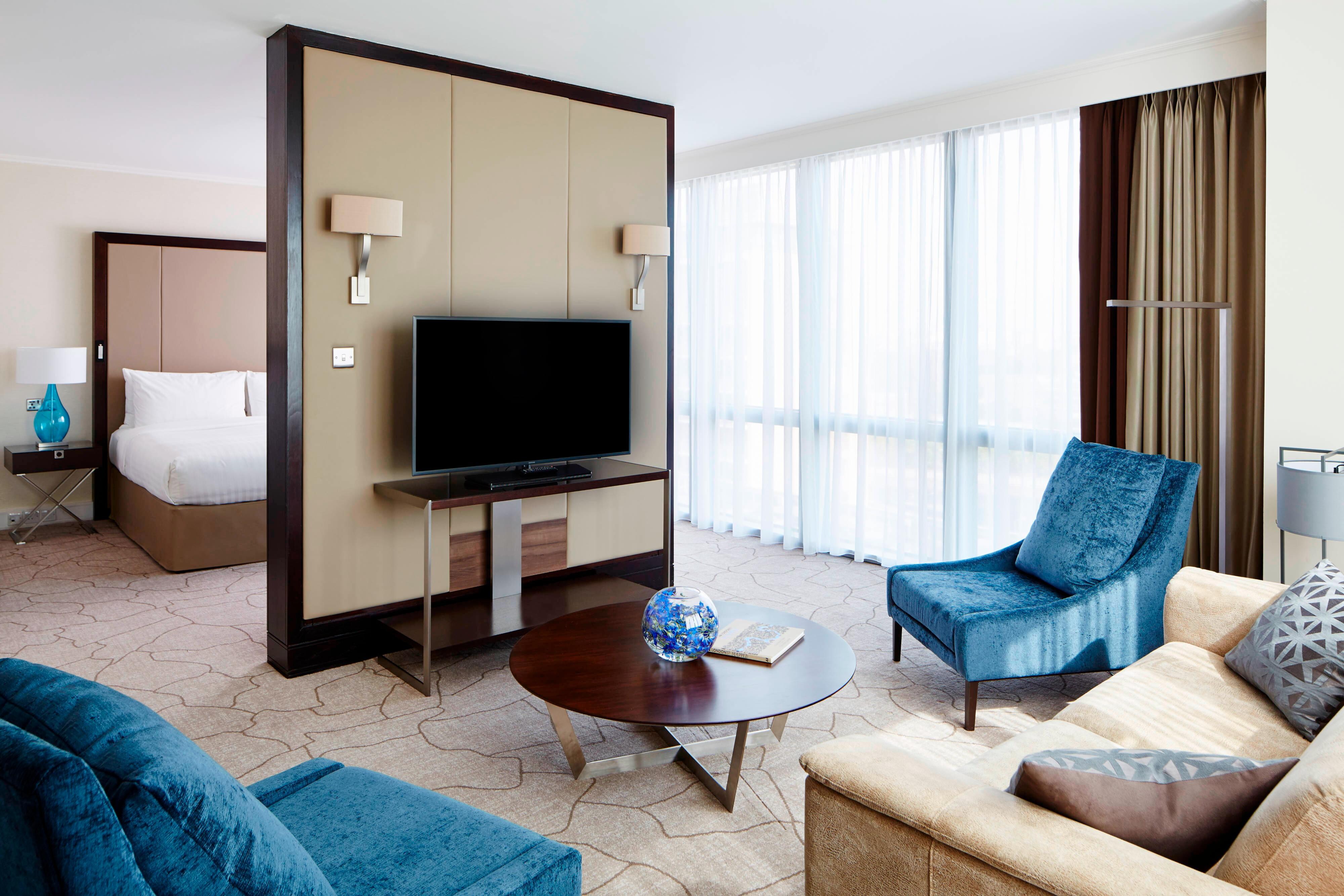 Suite living area couch and tv