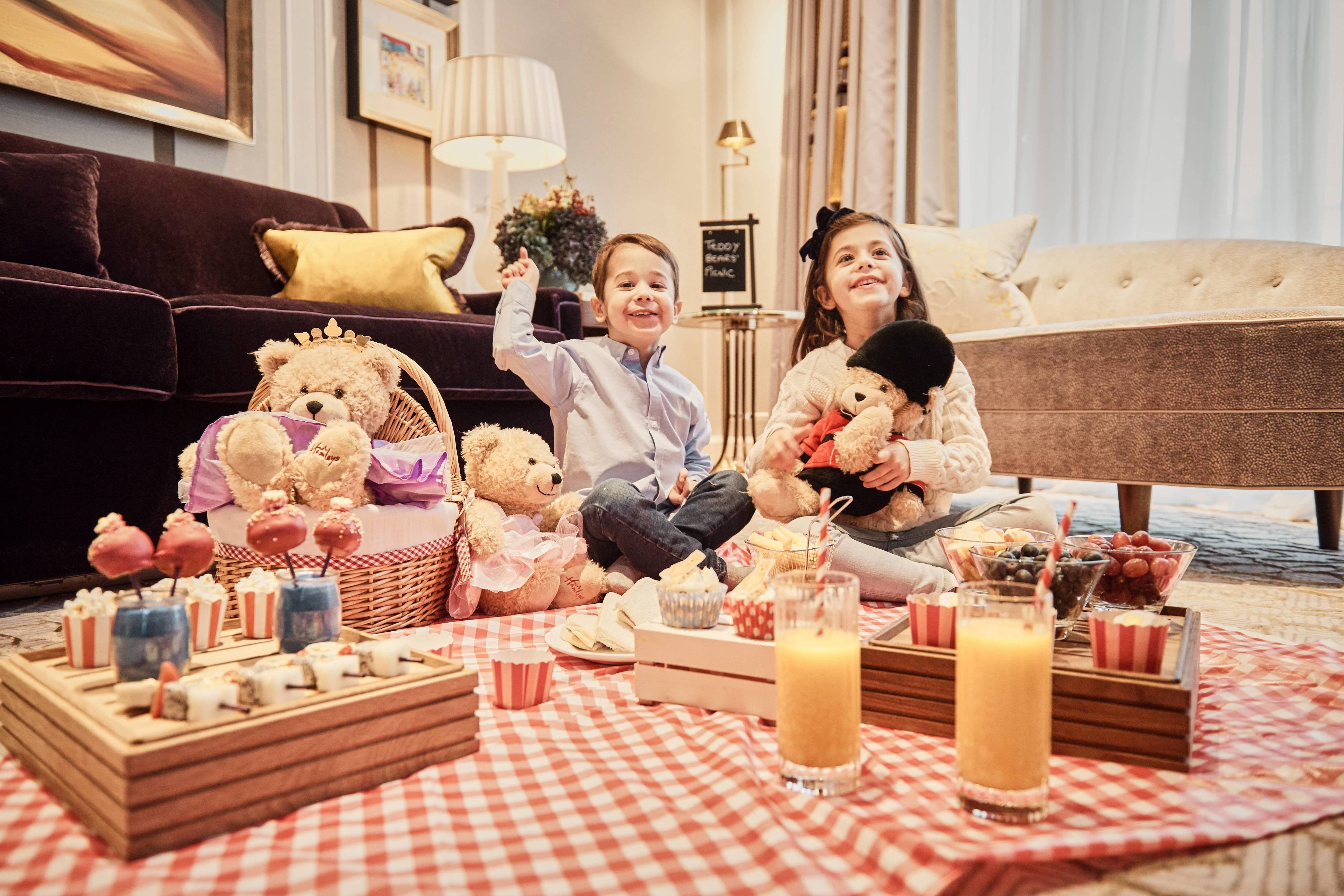 Children playing with teddy bears