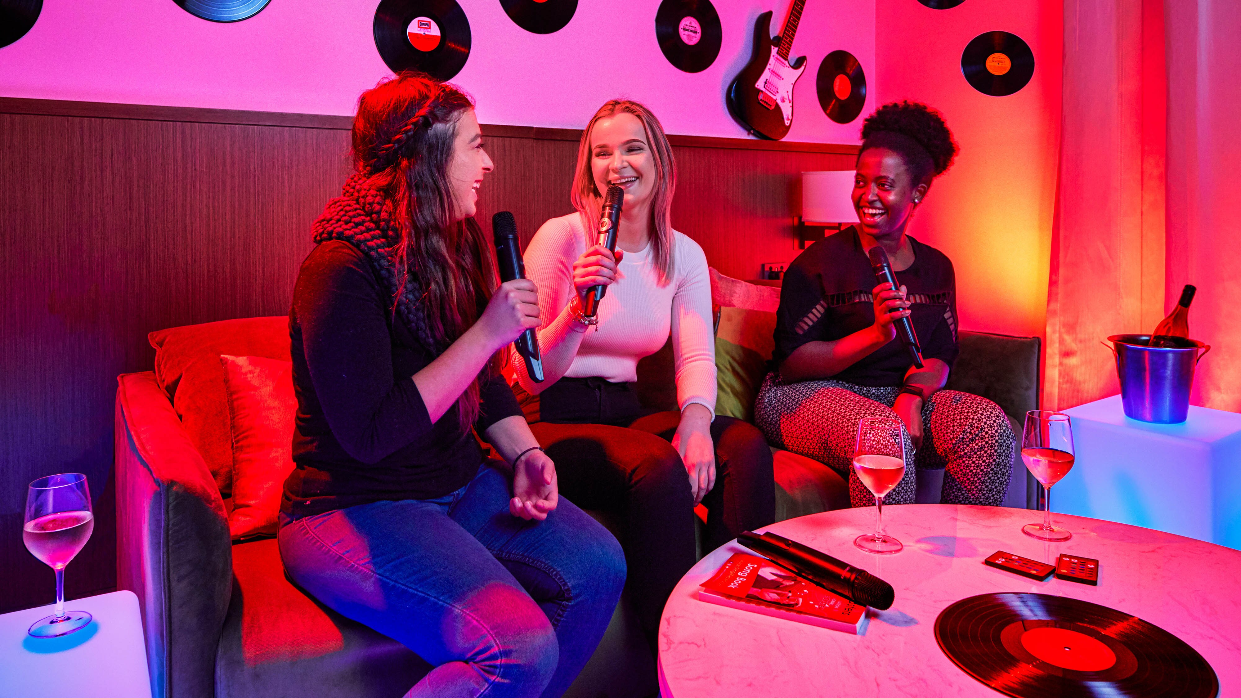 Friends singing karaoke