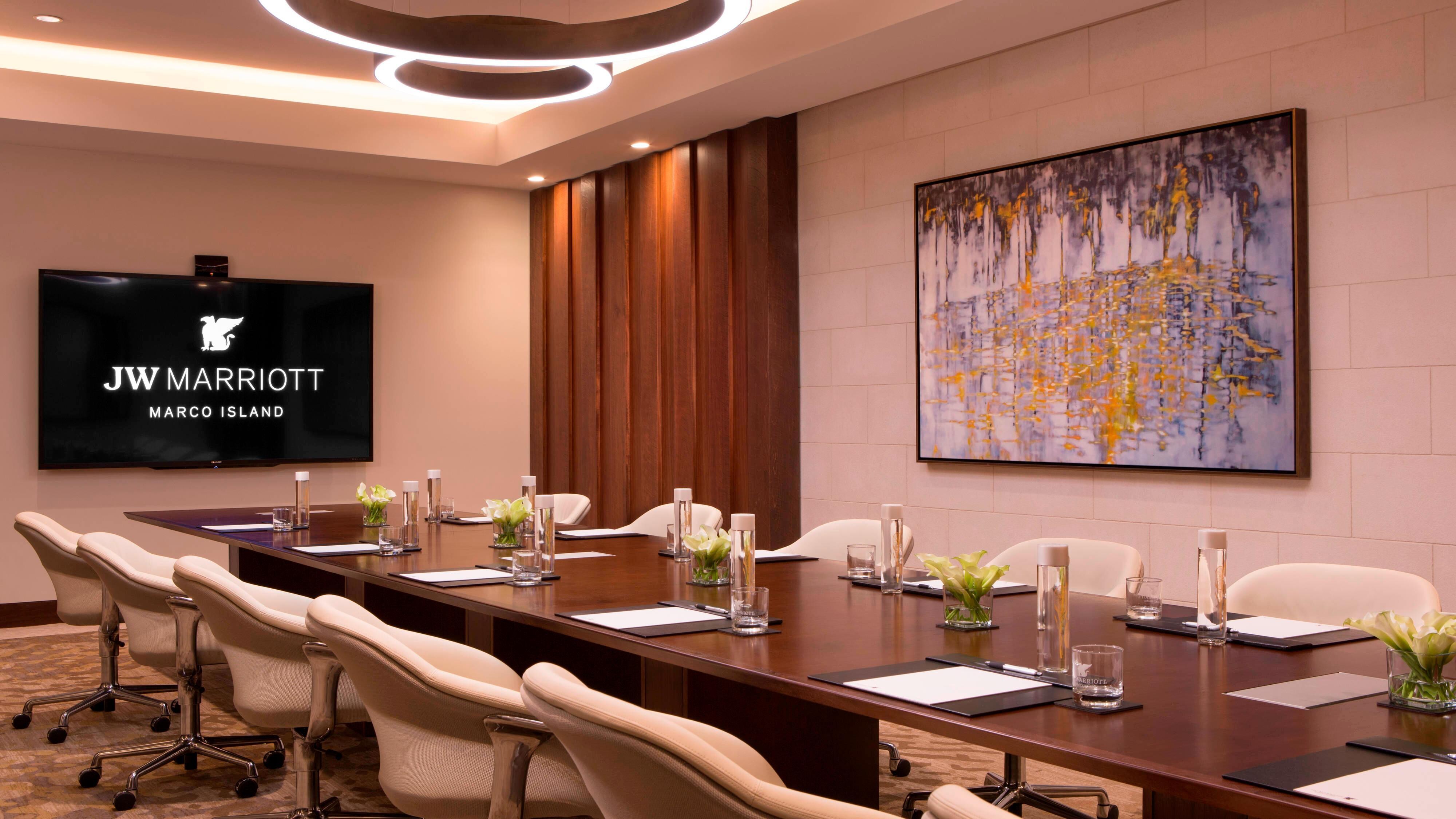 Boardroom meeting with TV