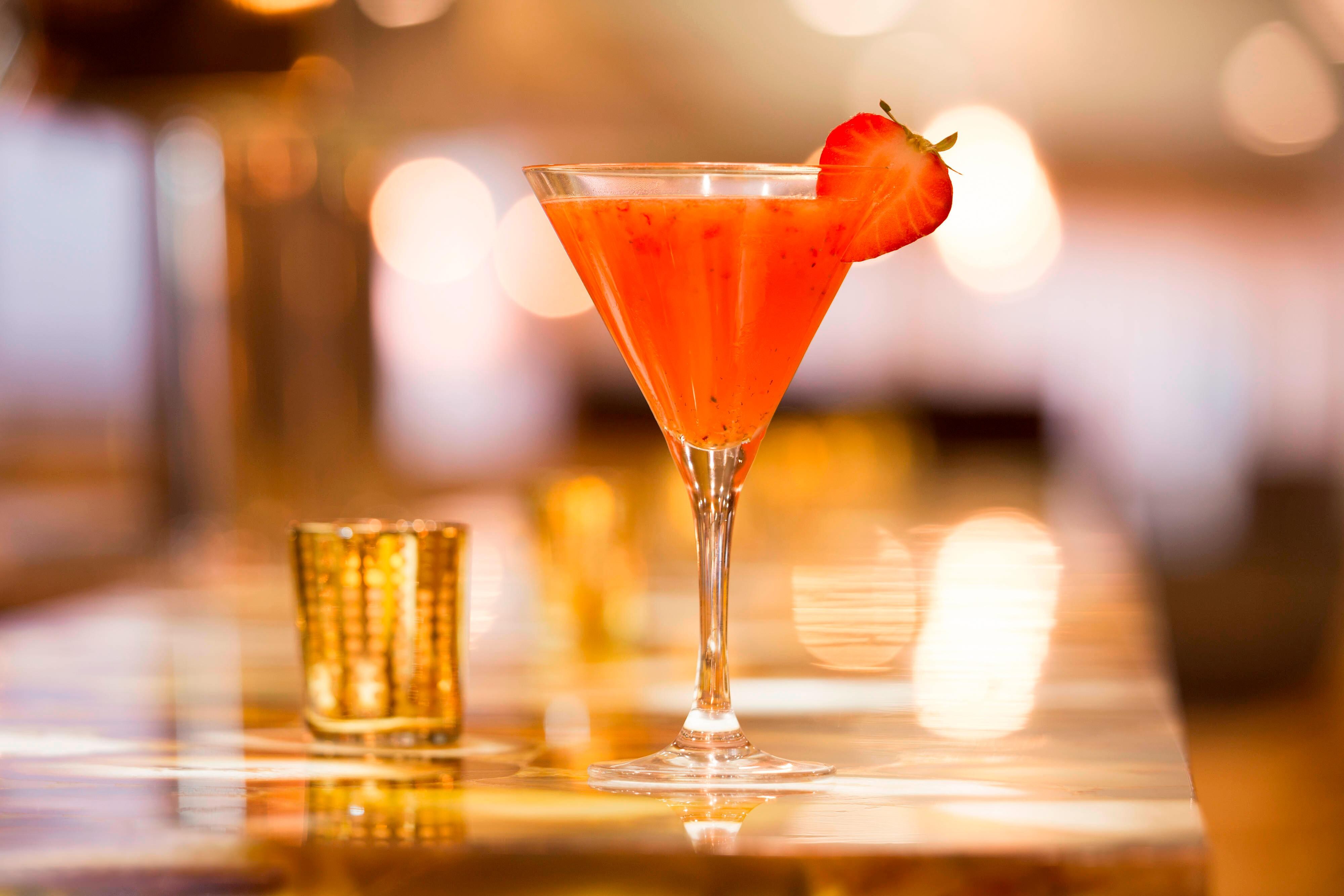 Cocktail with sliced strawberry