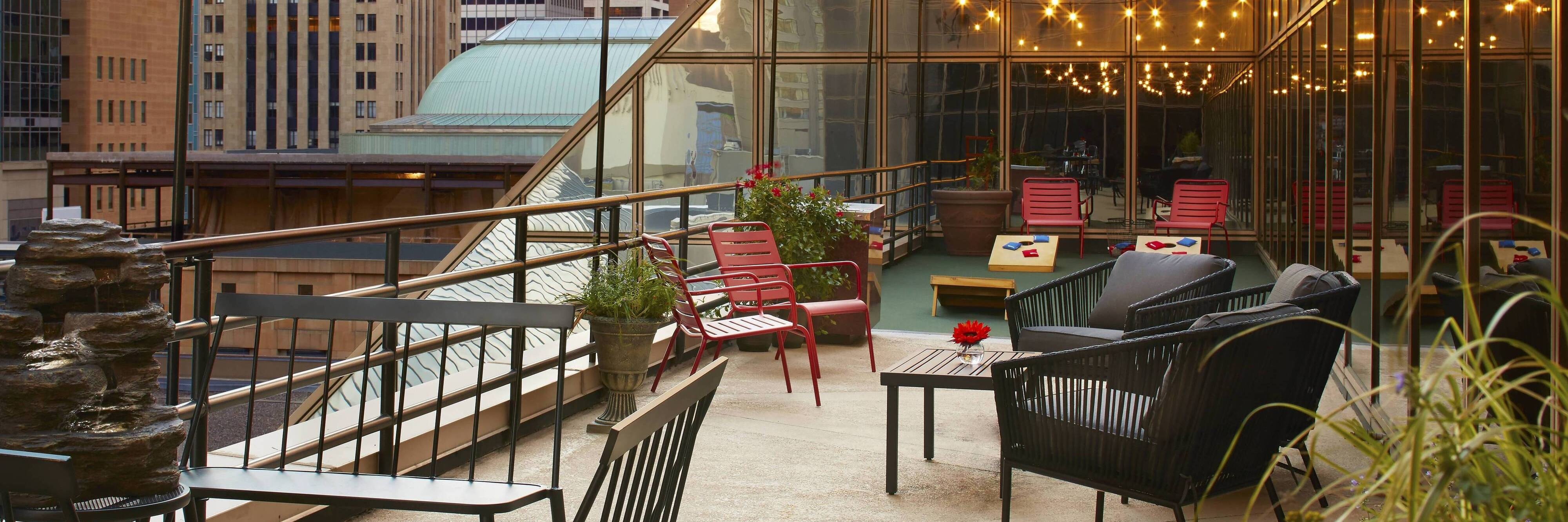 Outdoor patio with string lights and games