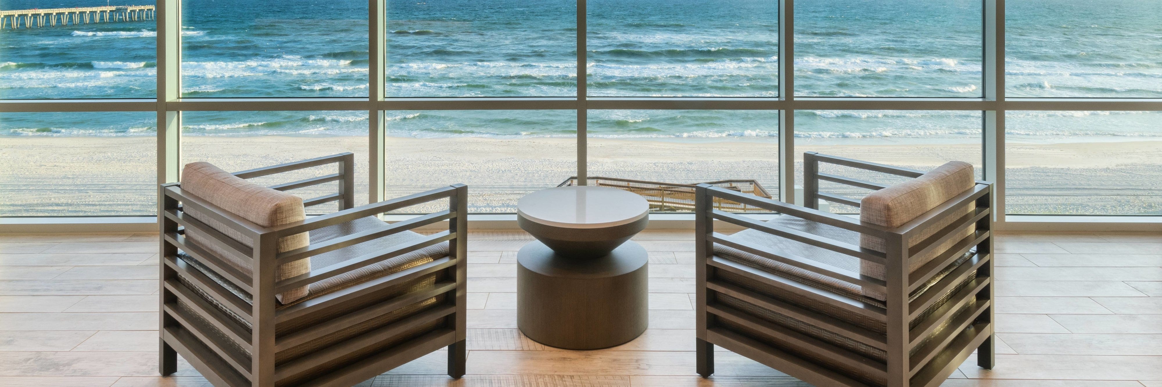 Lobby seating near window next to beach