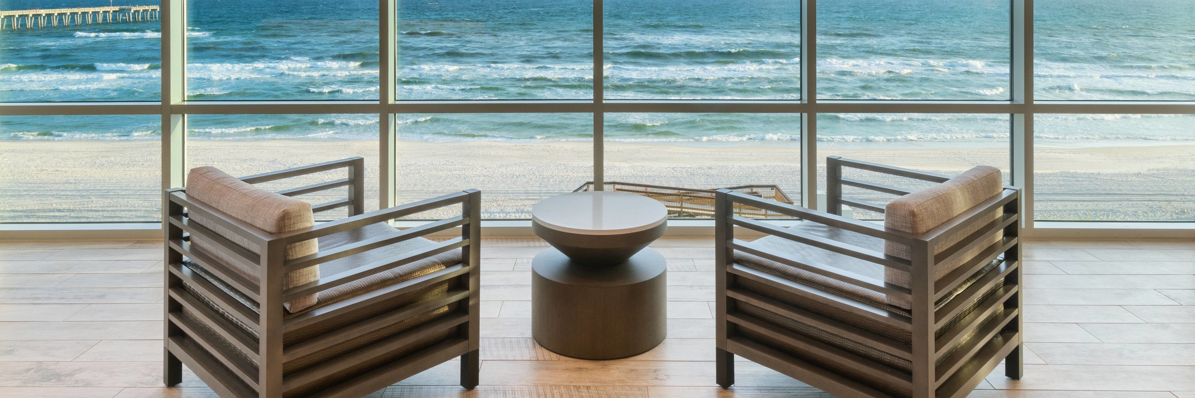 Lobby seating near window next to beach