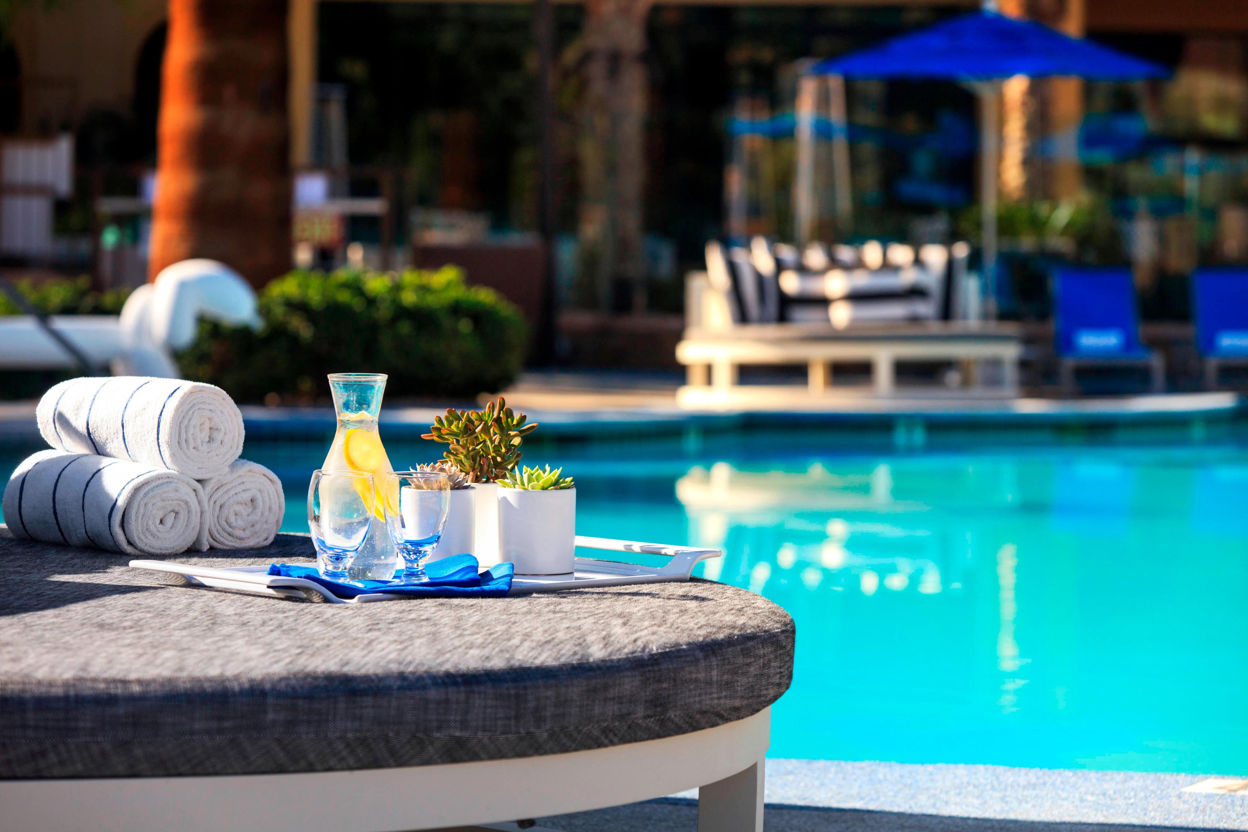 Poolside water and towels