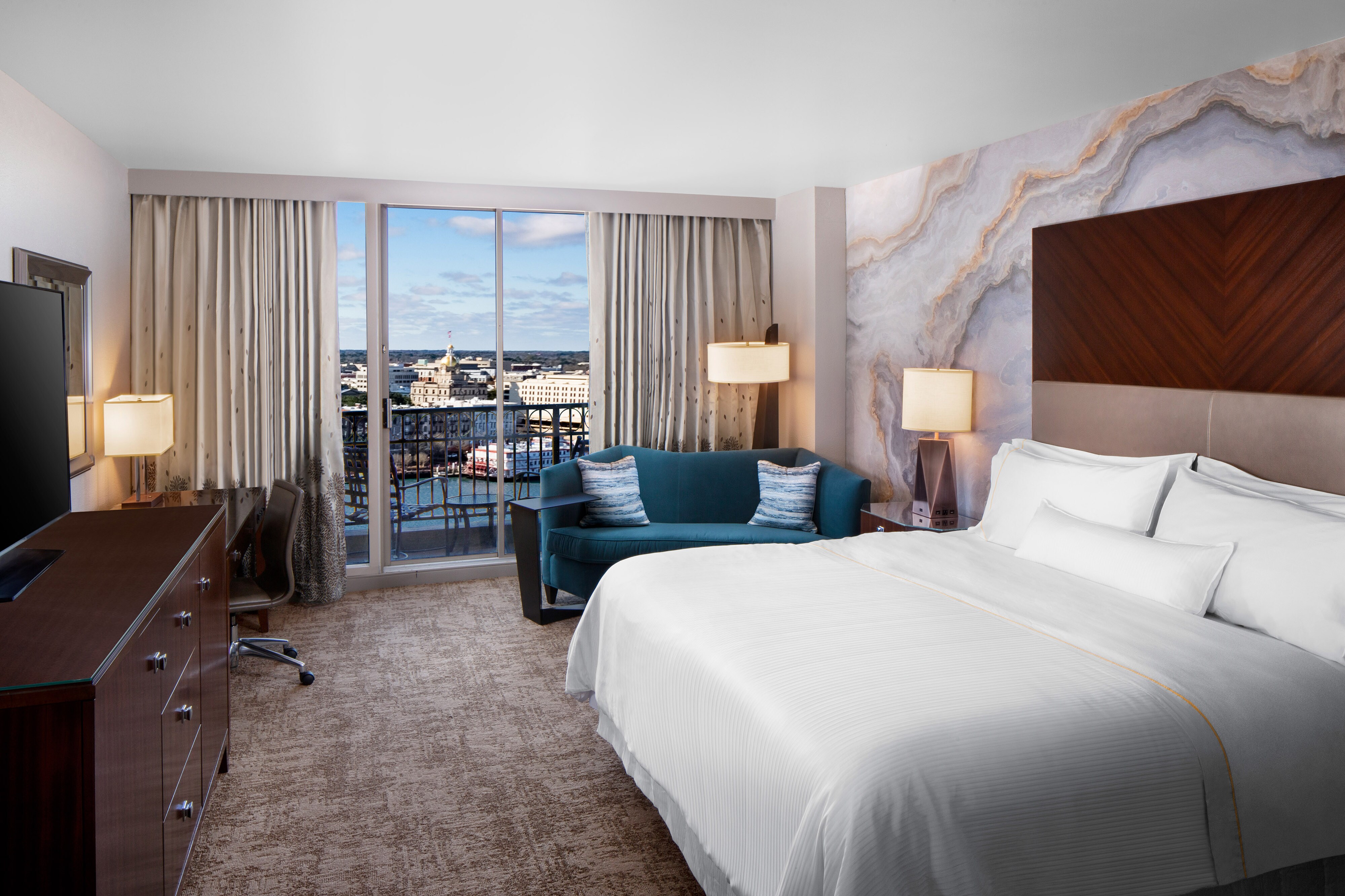 Guestroom with balcony and river view