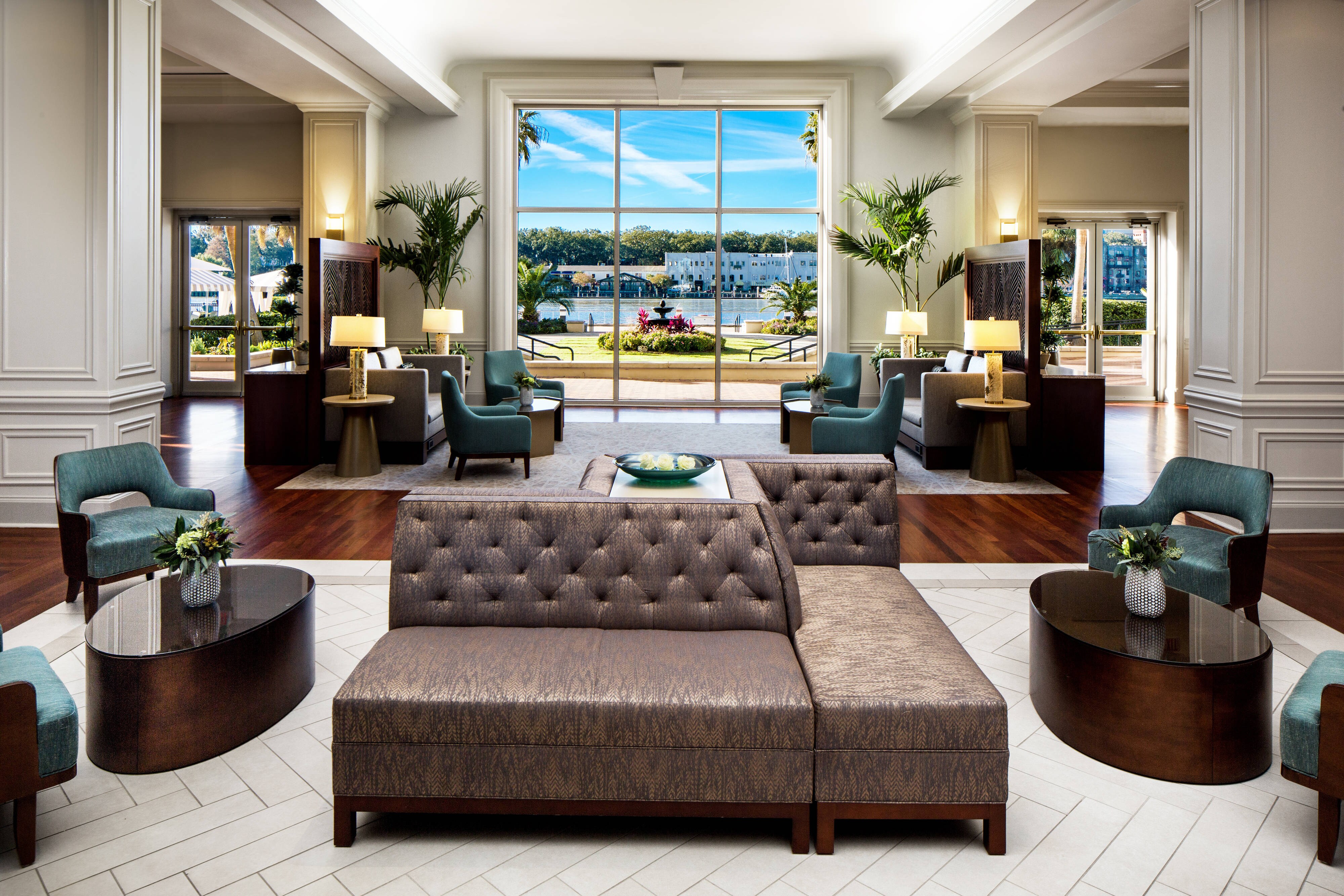 Lobby seating area with floor to ceiling windows