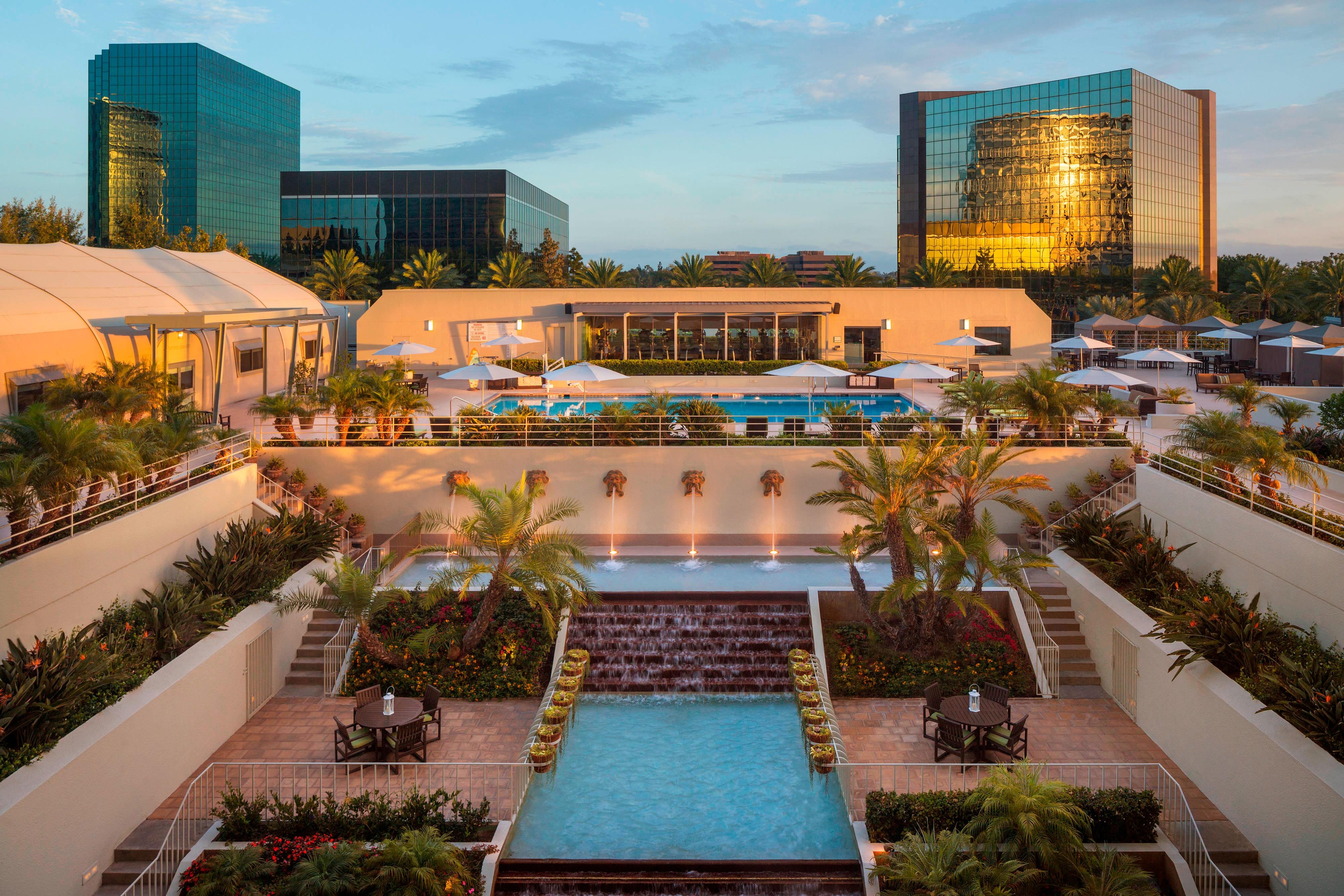 Outdoor swimming pool and waterfall terrace