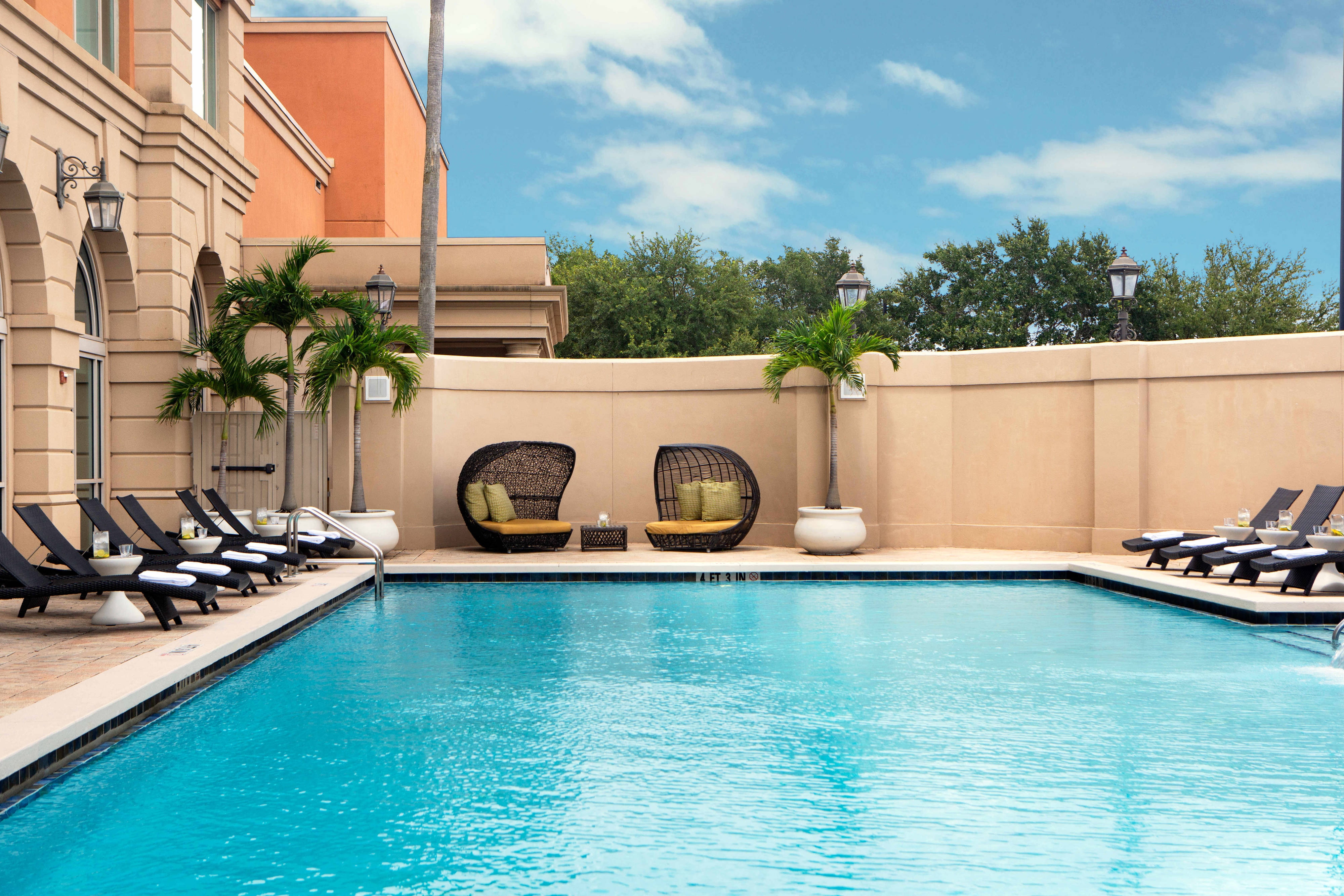 Outdoor pool with seating