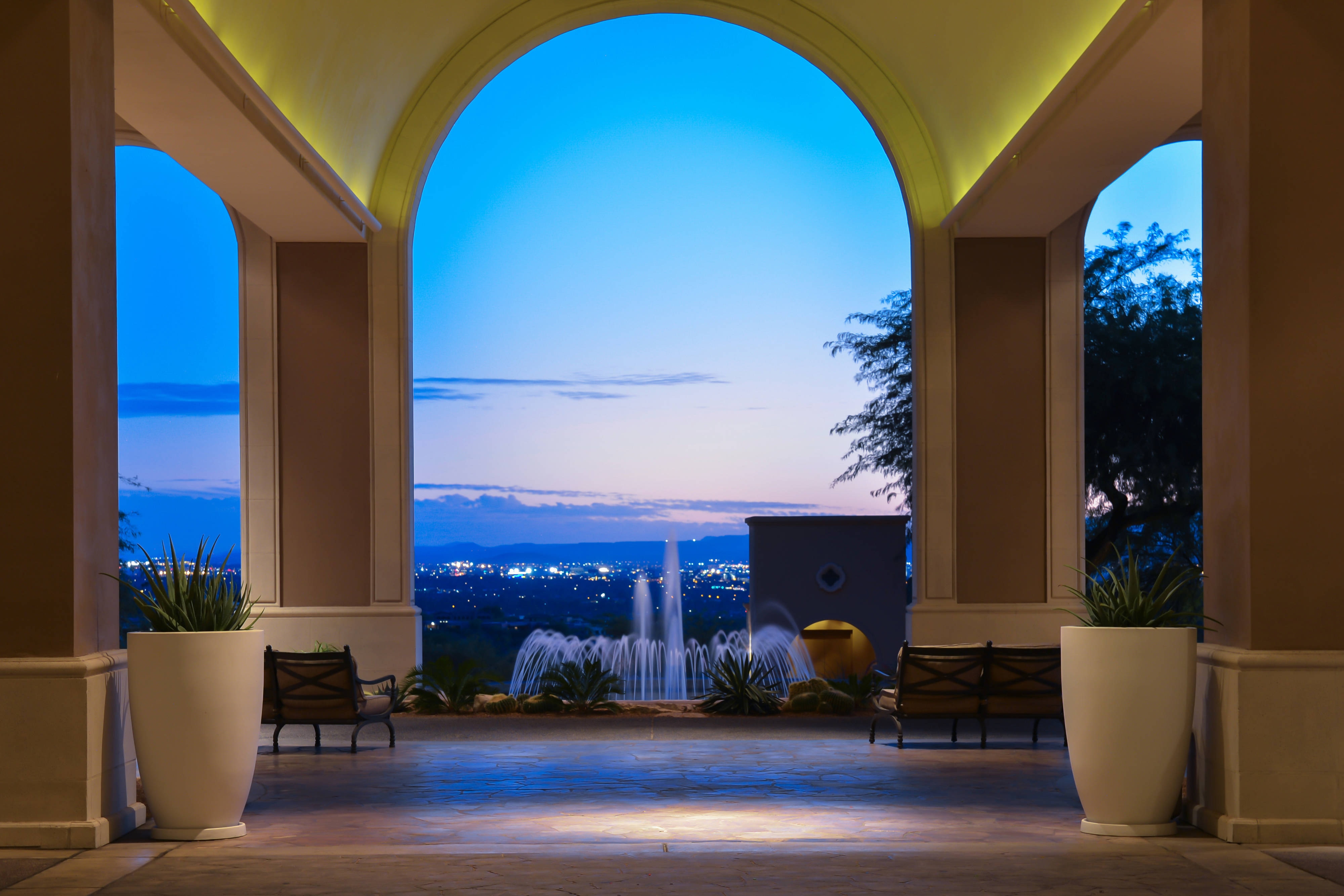 Front drive entrance with waterfall and scenic view