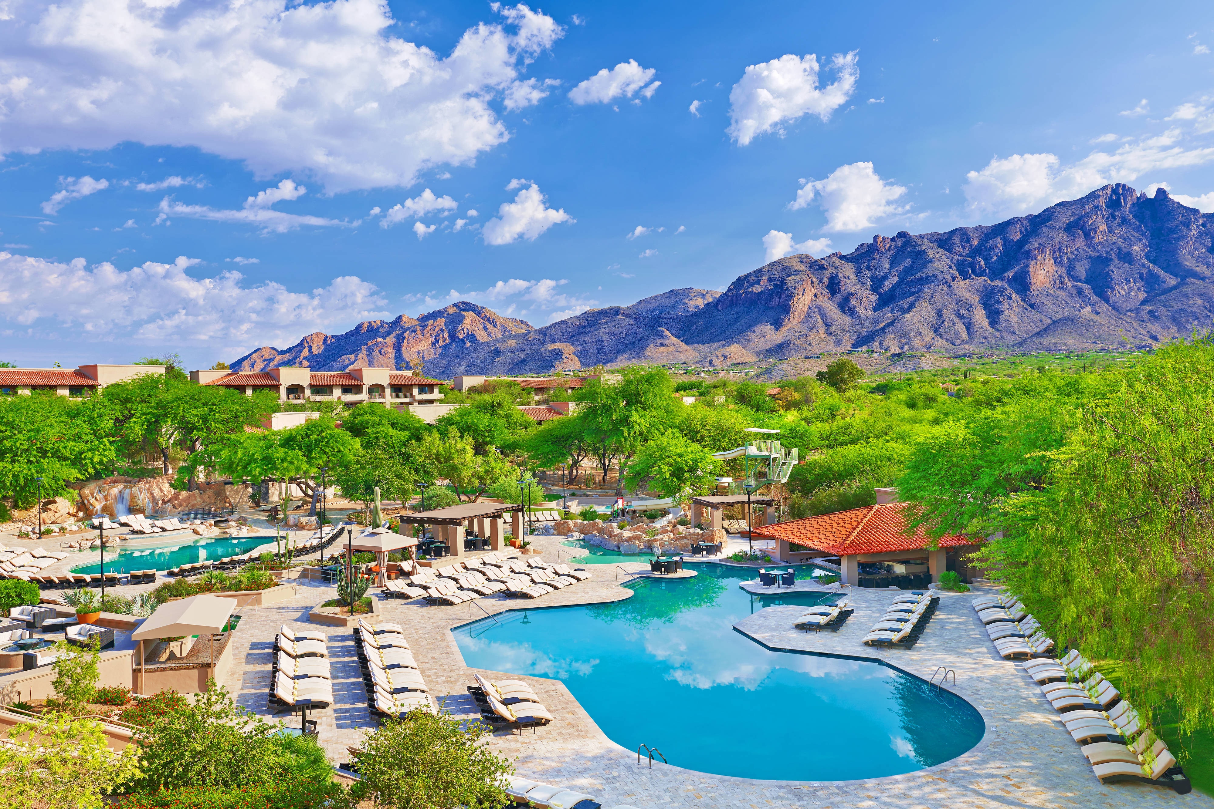Outdoor pool aerial view with mountains