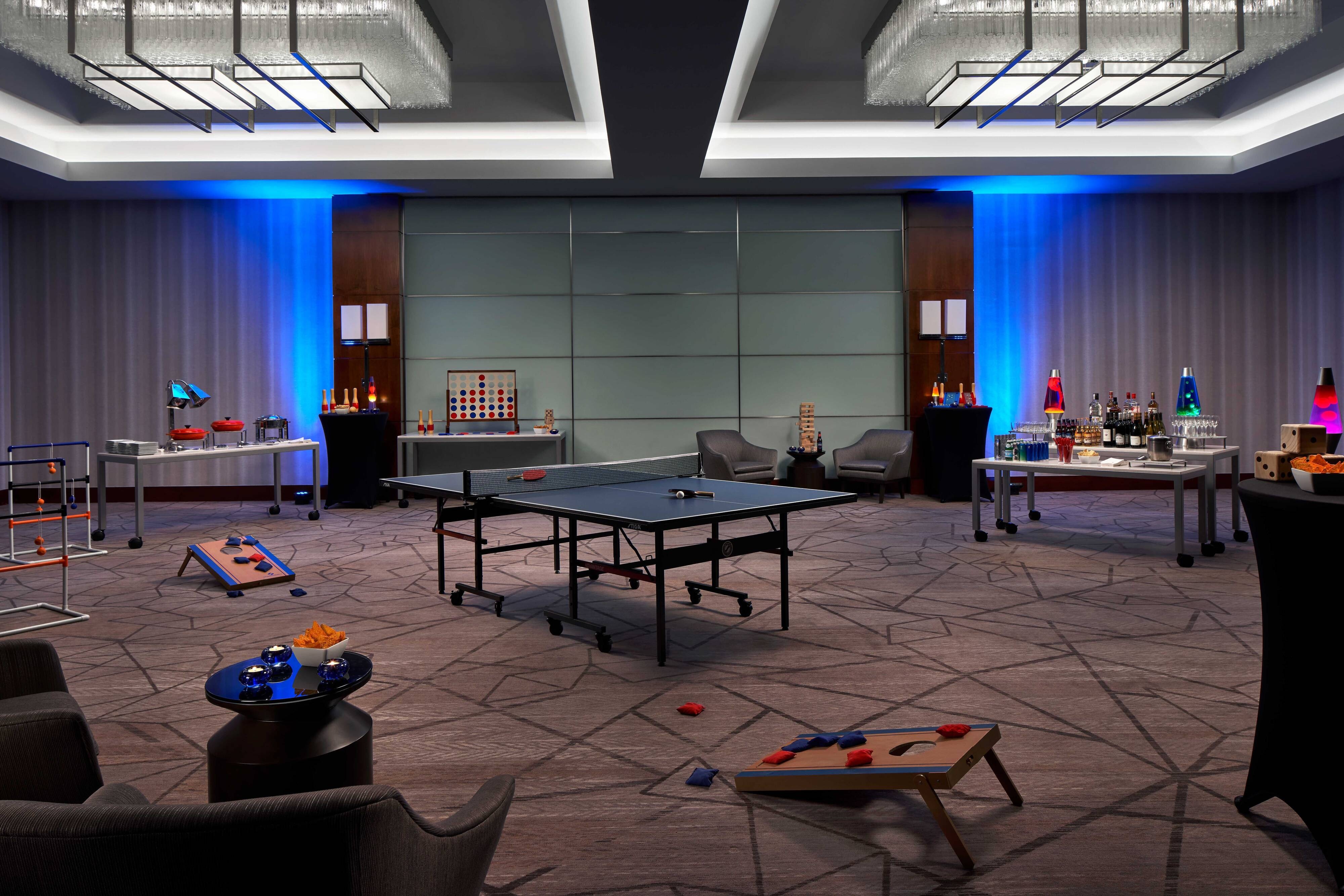 Grand Ballroom set up with games and snack stations