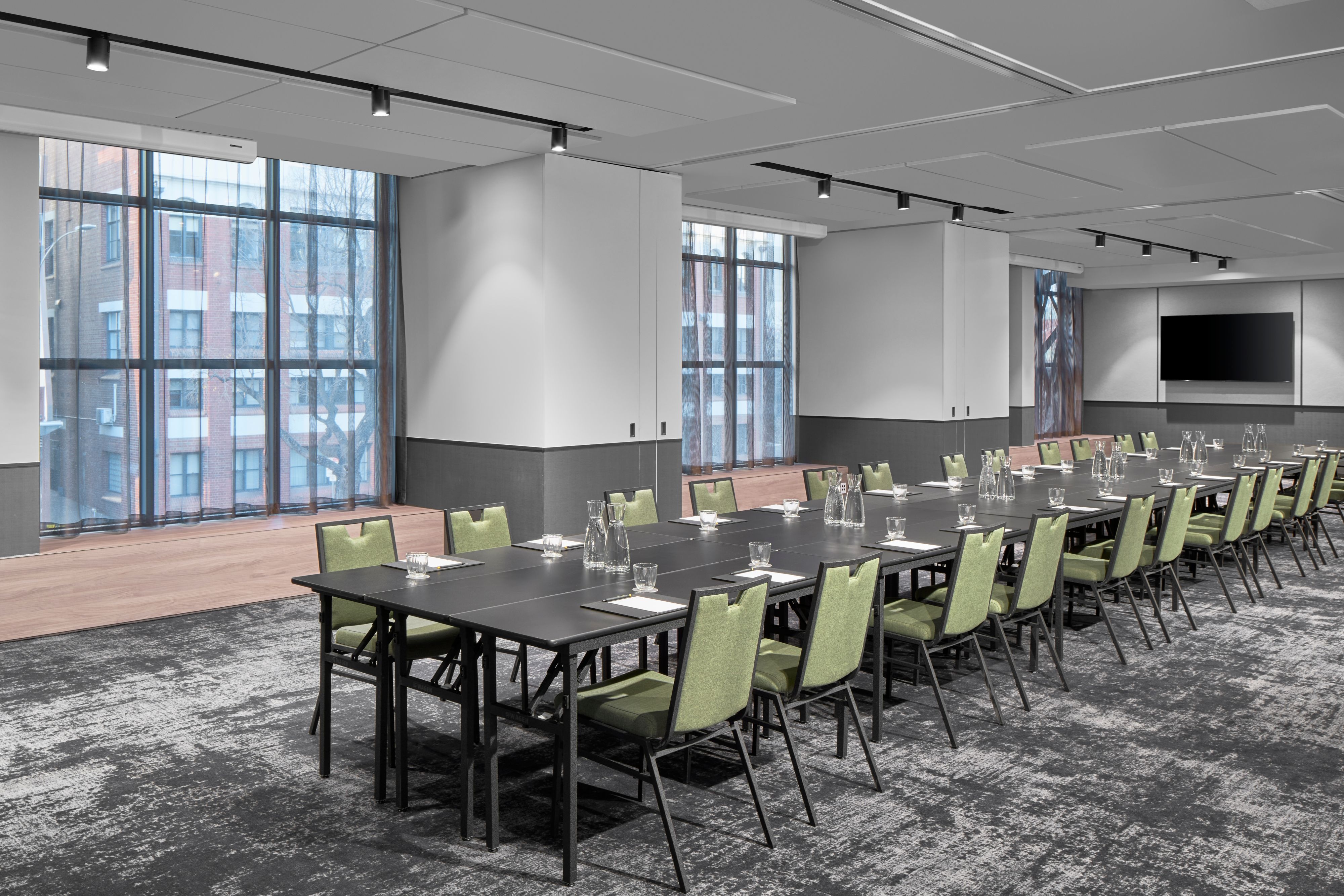 Meeting room with large windows and long table