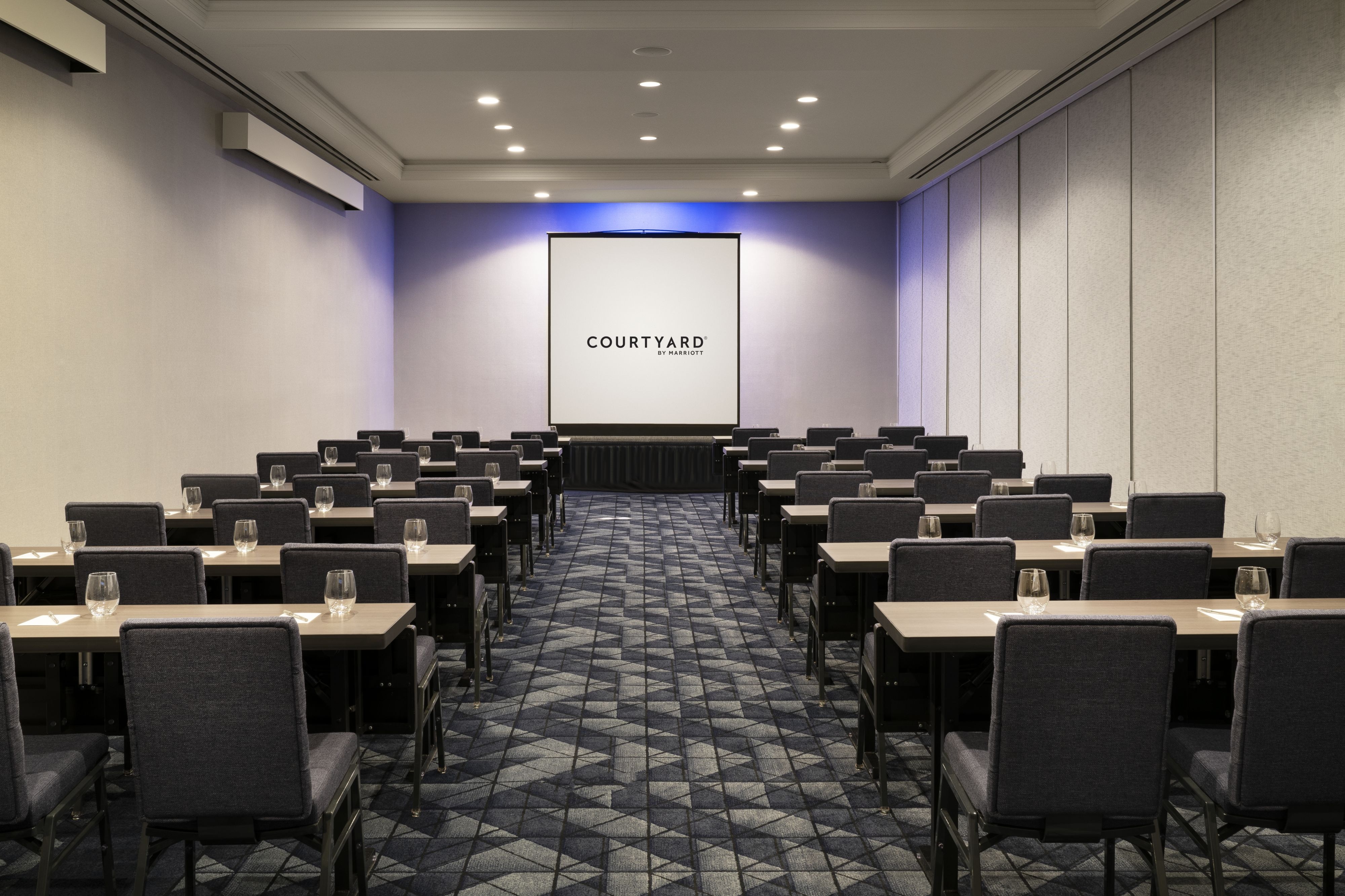 Meeting room with projector screen.