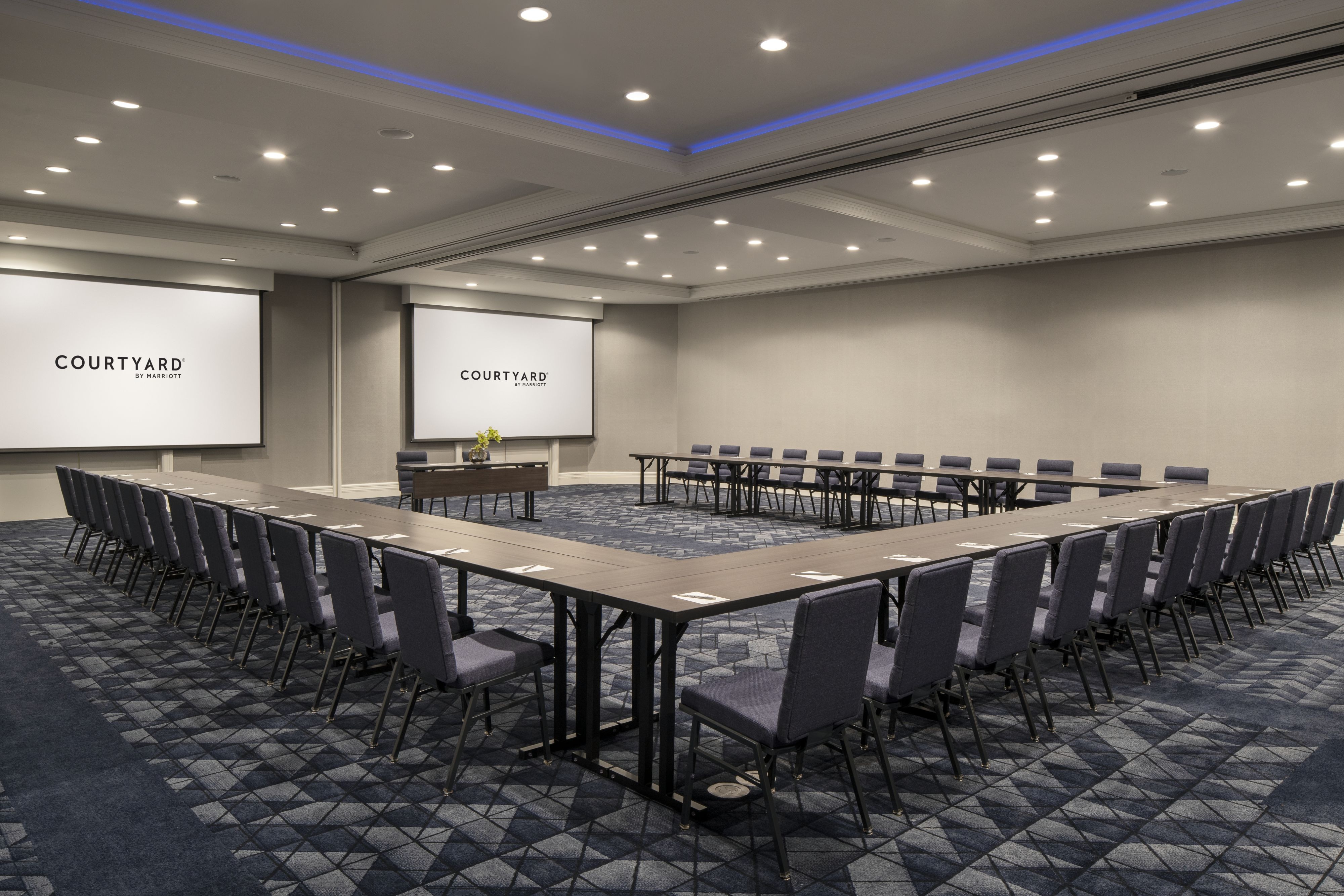 Meeting room with projector screen.