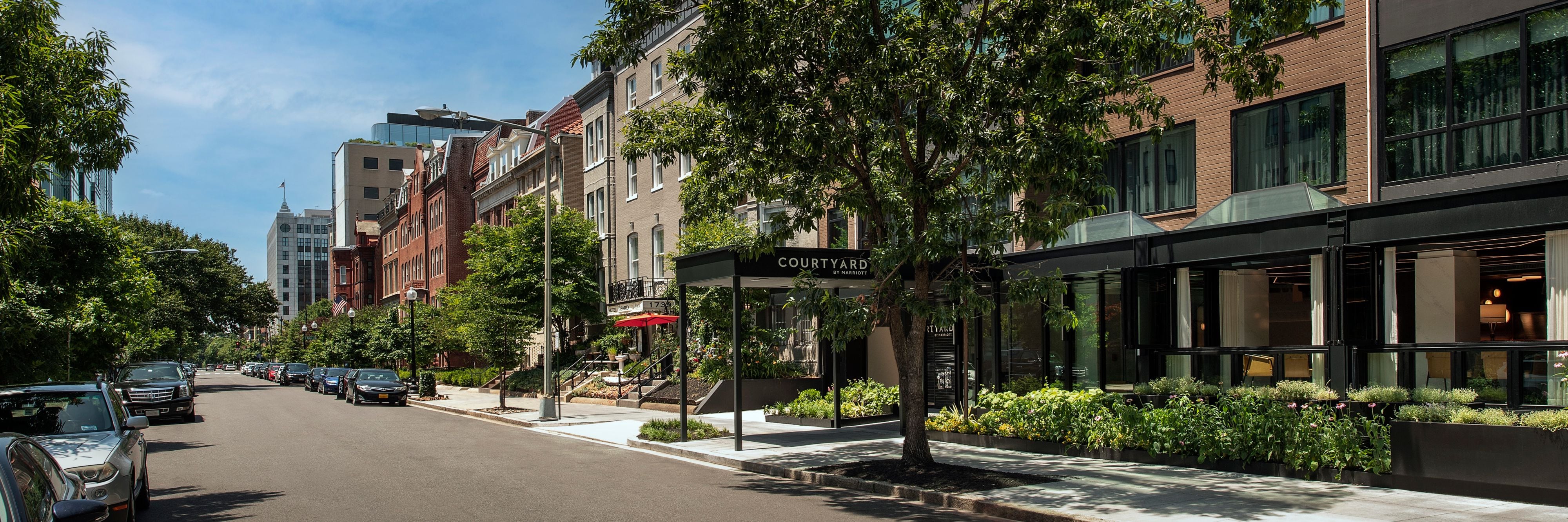 Hotel exterior on a sunny city street