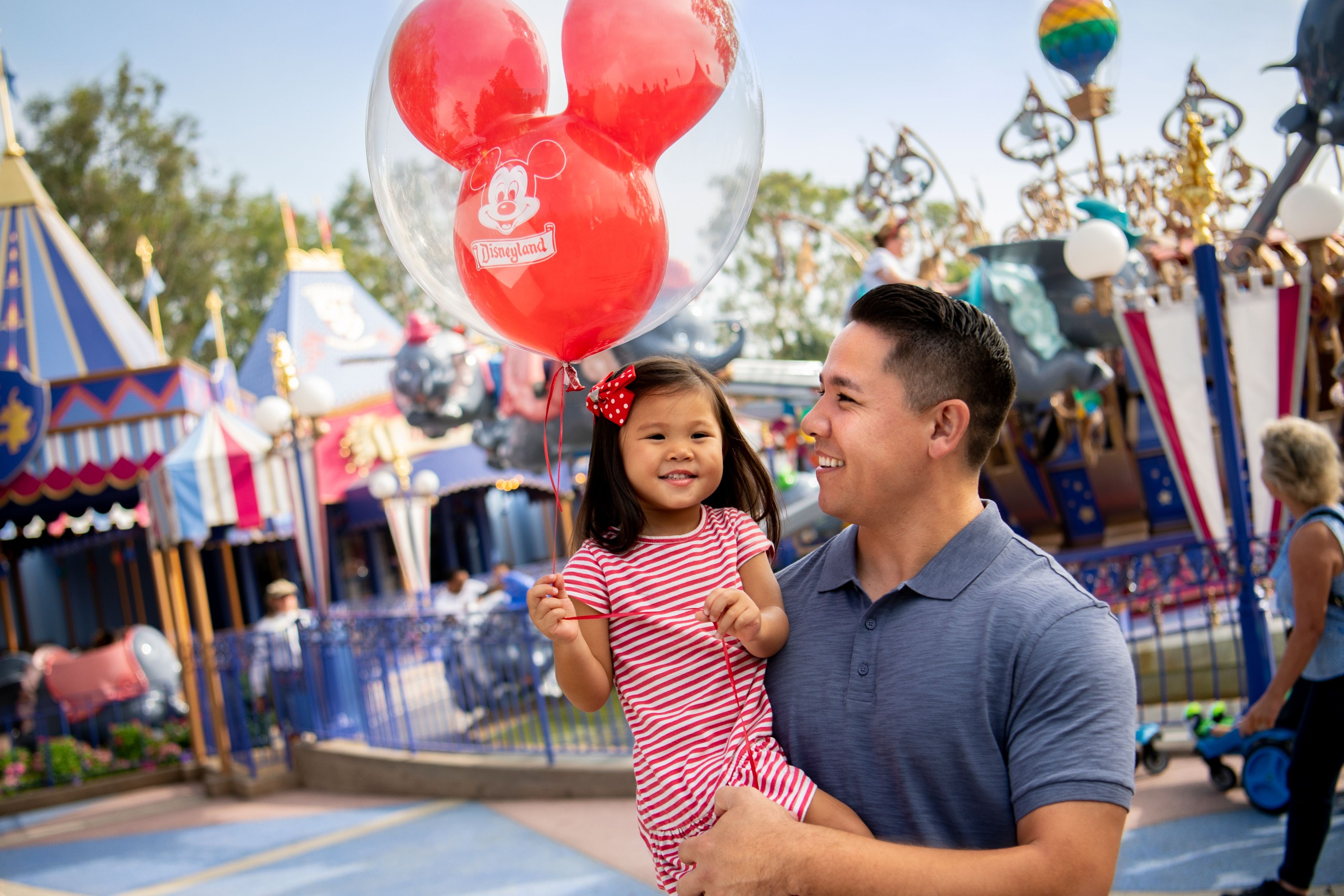 A father and child at Disneyland
