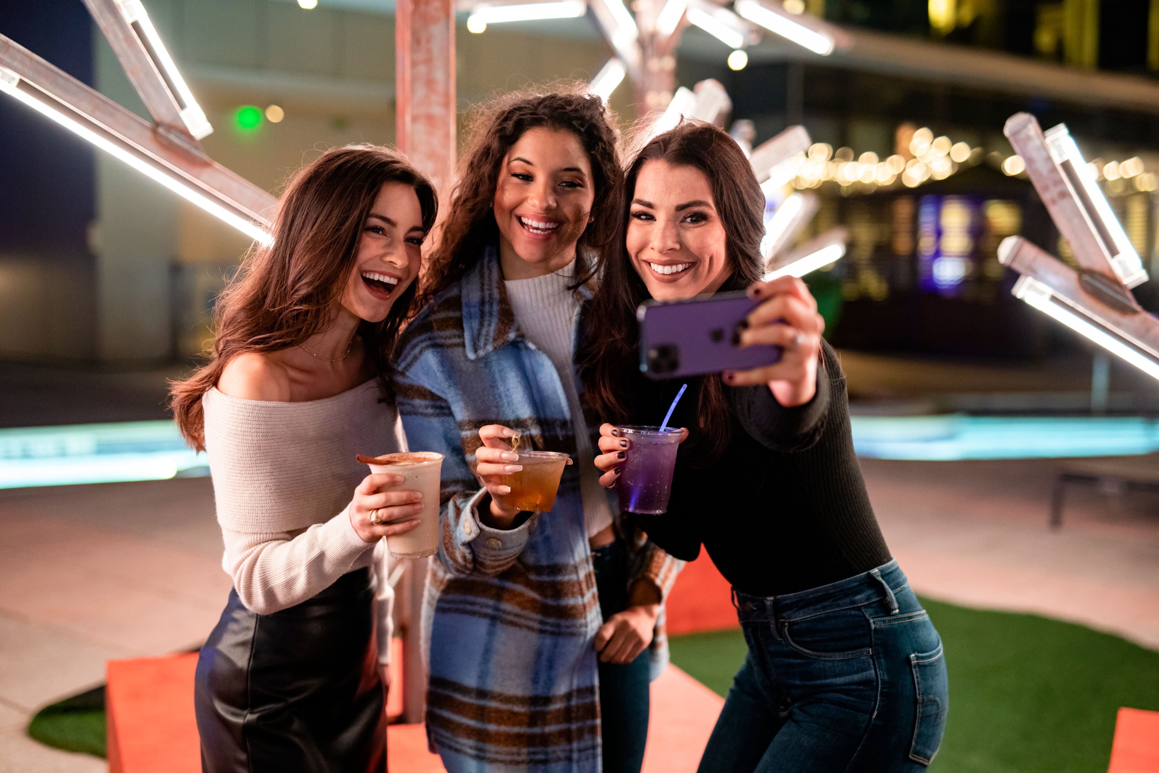 Group of friends hanging out at the Texas Winter Lights