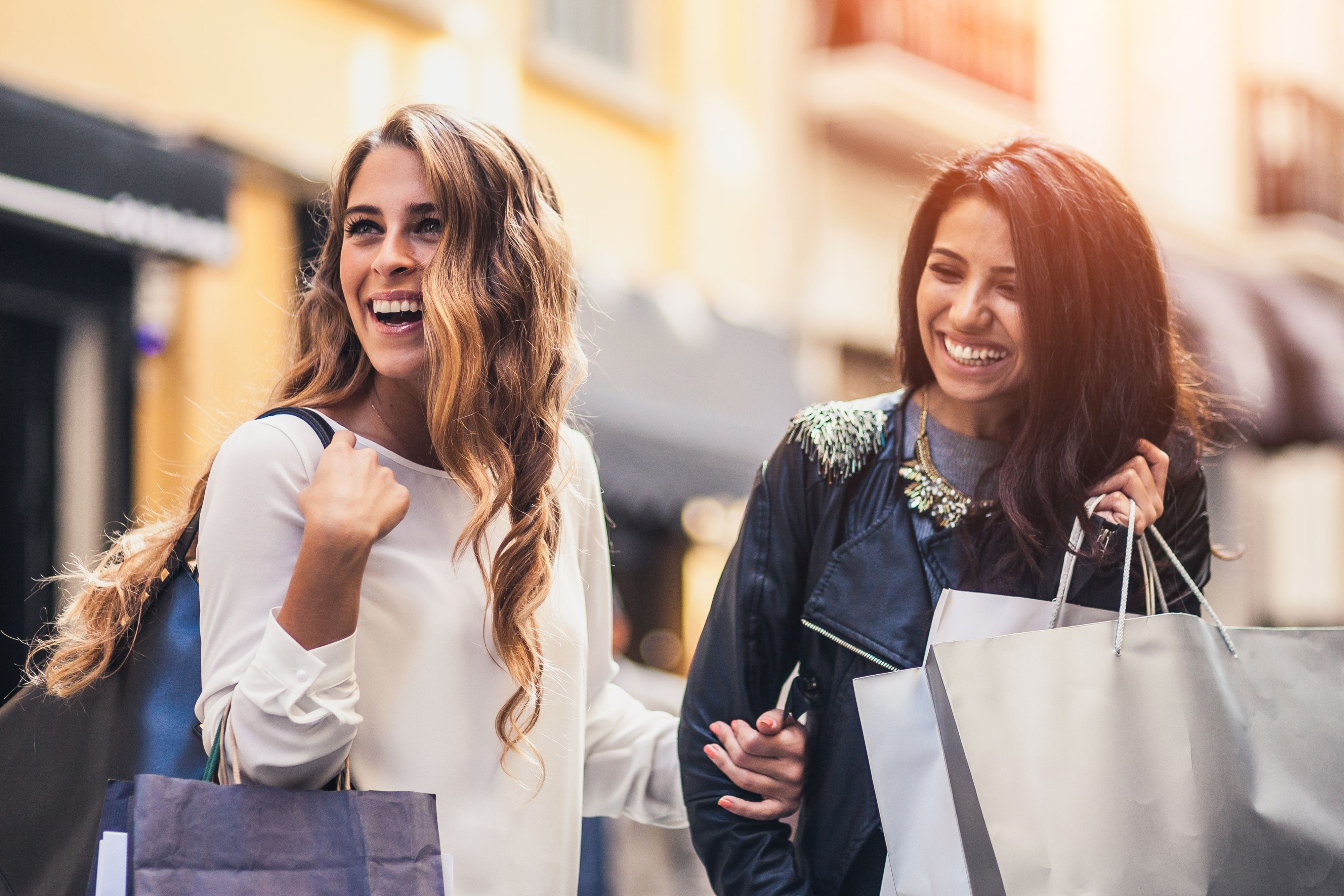 People holding shopping bags